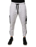 Pantalons cargo sweatpants Dolce & Gabbana en coton blanc avec poches latérales et taille élastique, style décontracté et tendance.
