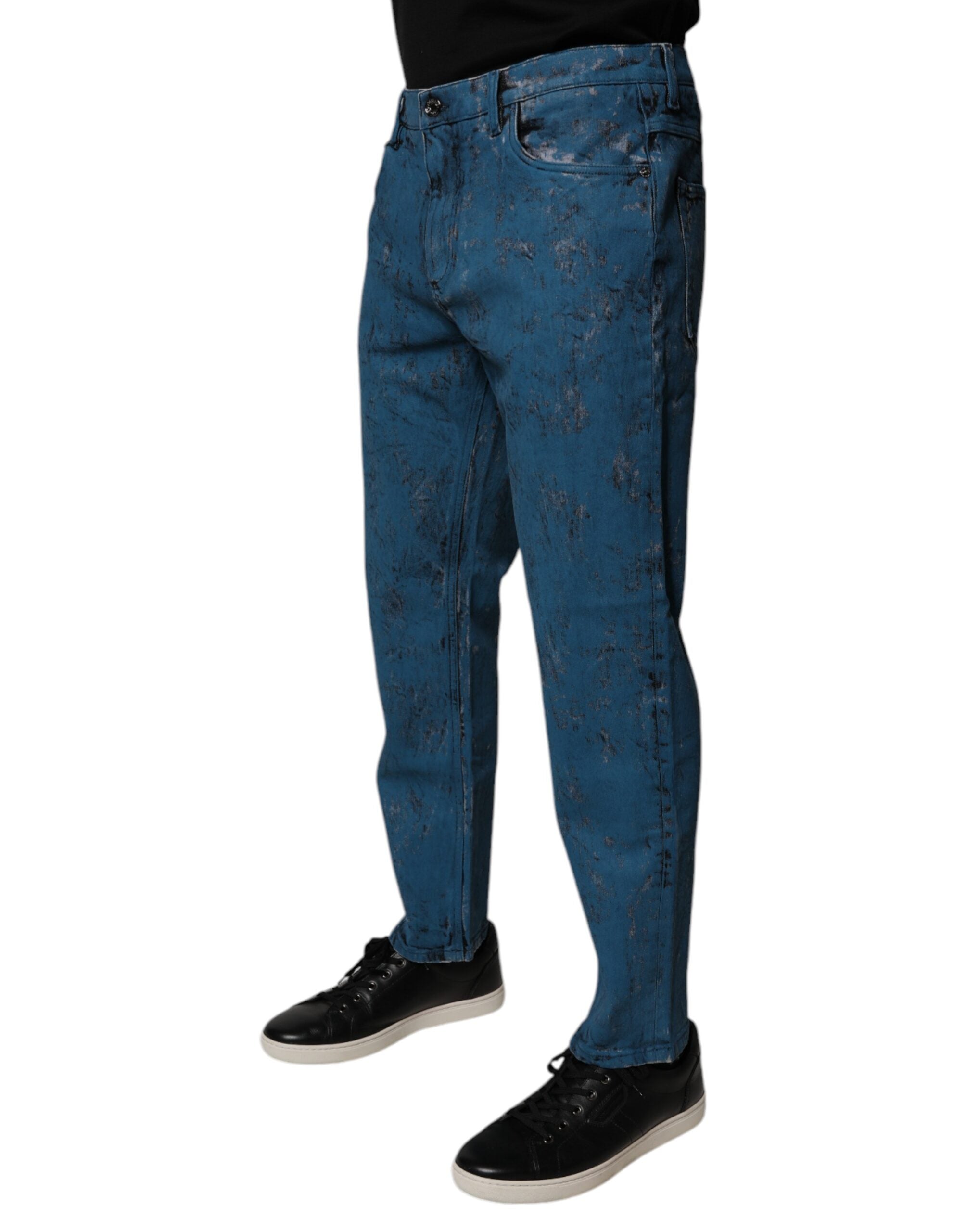 Jeans slim en denim coton à teinture tie-dye bleue de Dolce & Gabbana pour homme, vue de face.