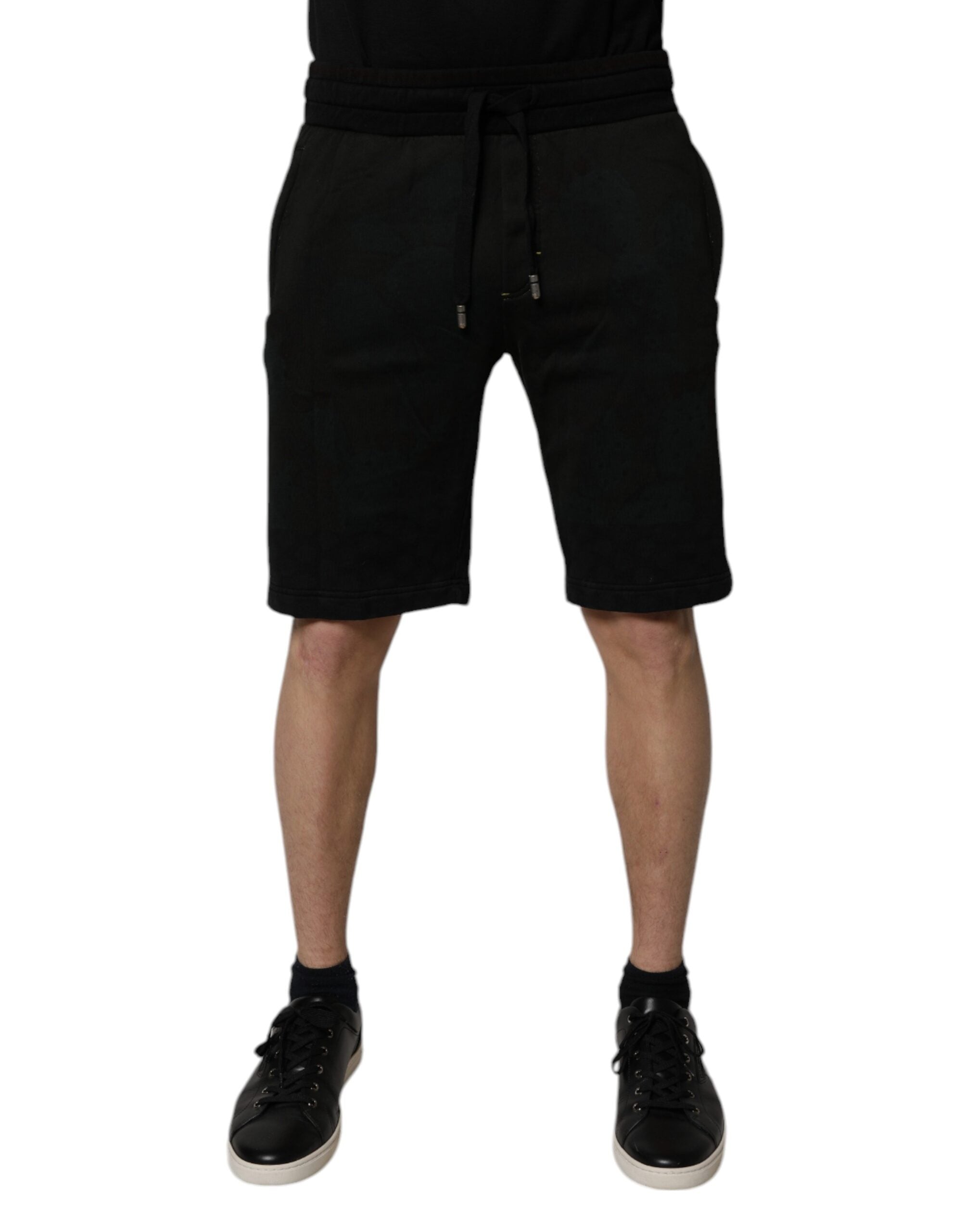 Shorts bermuda en coton noir de Dolce & Gabbana pour homme, style décontracté et élégant, avec logo discret.