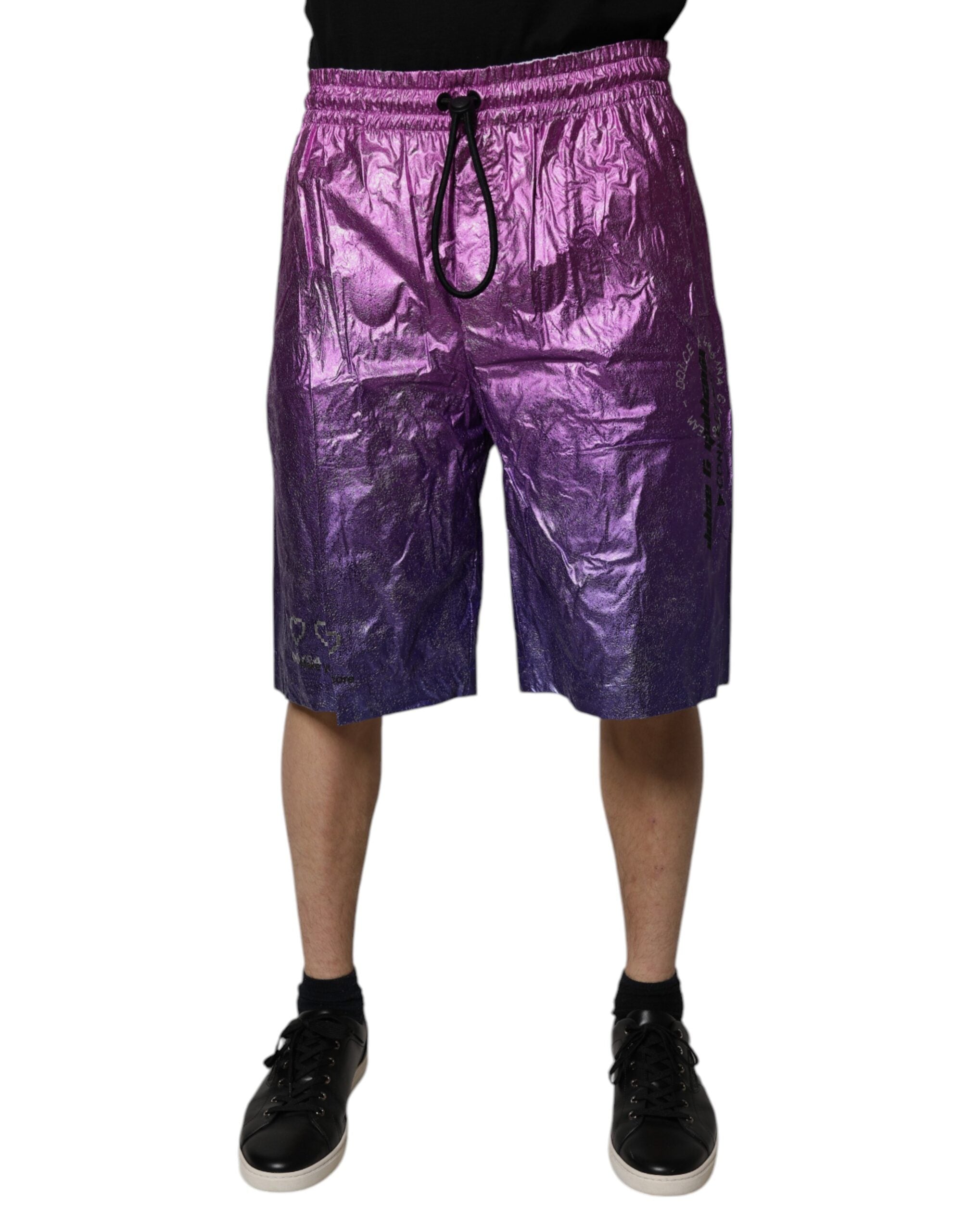 Shorts bermuda métalliques rose et violet Dolce & Gabbana, deux tons, en tissu brillant, vue de face.