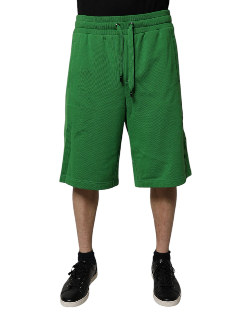 Shorts bermuda en coton vert Dolce & Gabbana pour homme, sweatshorts décontractés avec logo de la marque visible.