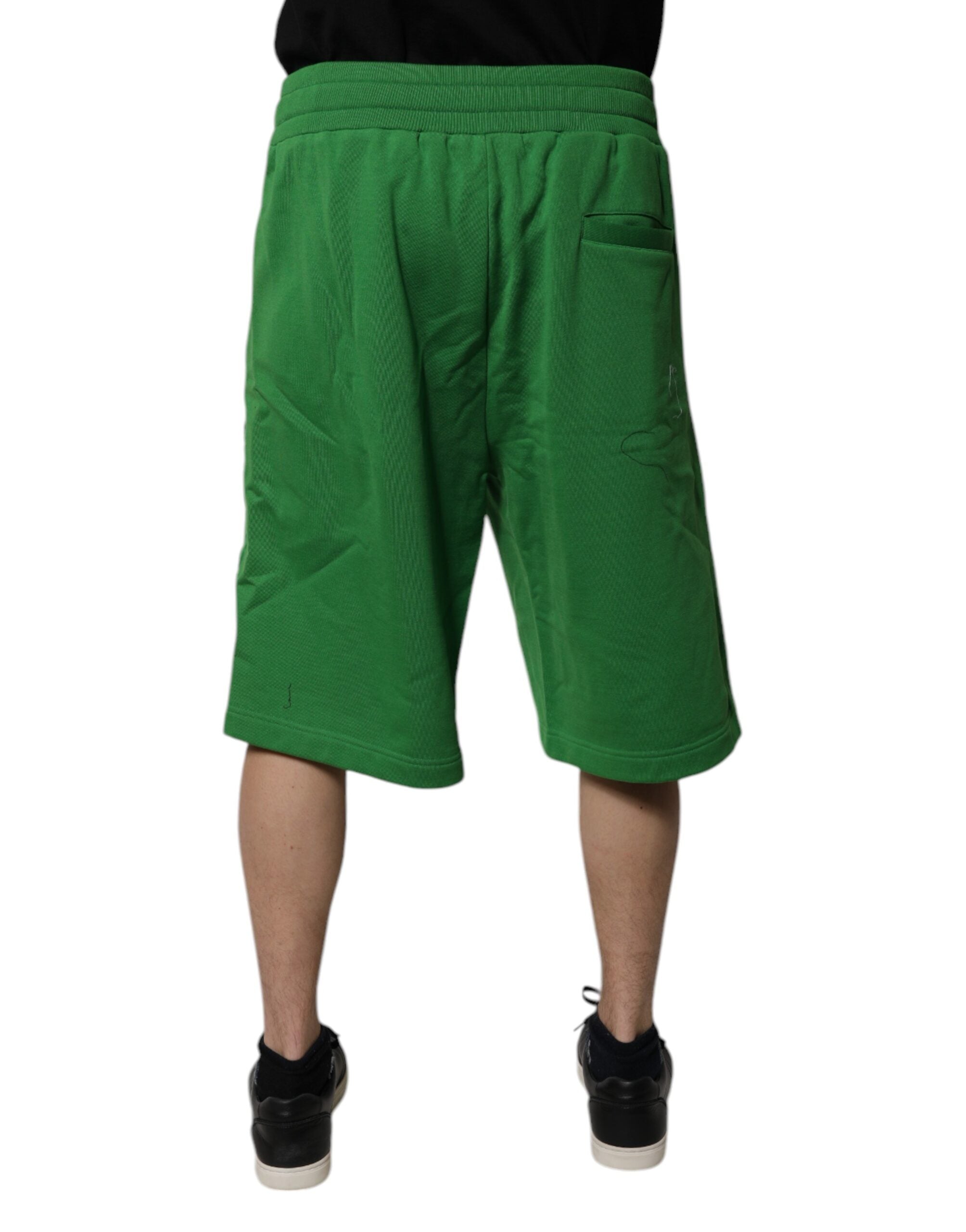Shorts bermuda pour homme en coton vert Dolce & Gabbana, sweatshorts décontractés avec logo de la marque visible.