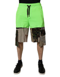 Shorts cargo pour hommes Dolce & Gabbana en patchwork camouflage vert, avec détails modernes et style décontracté.
