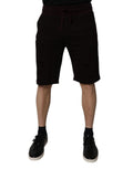 Shorts sweat en coton marron Dolce & Gabbana pour homme, bermuda décontracté avec poche et logo.
