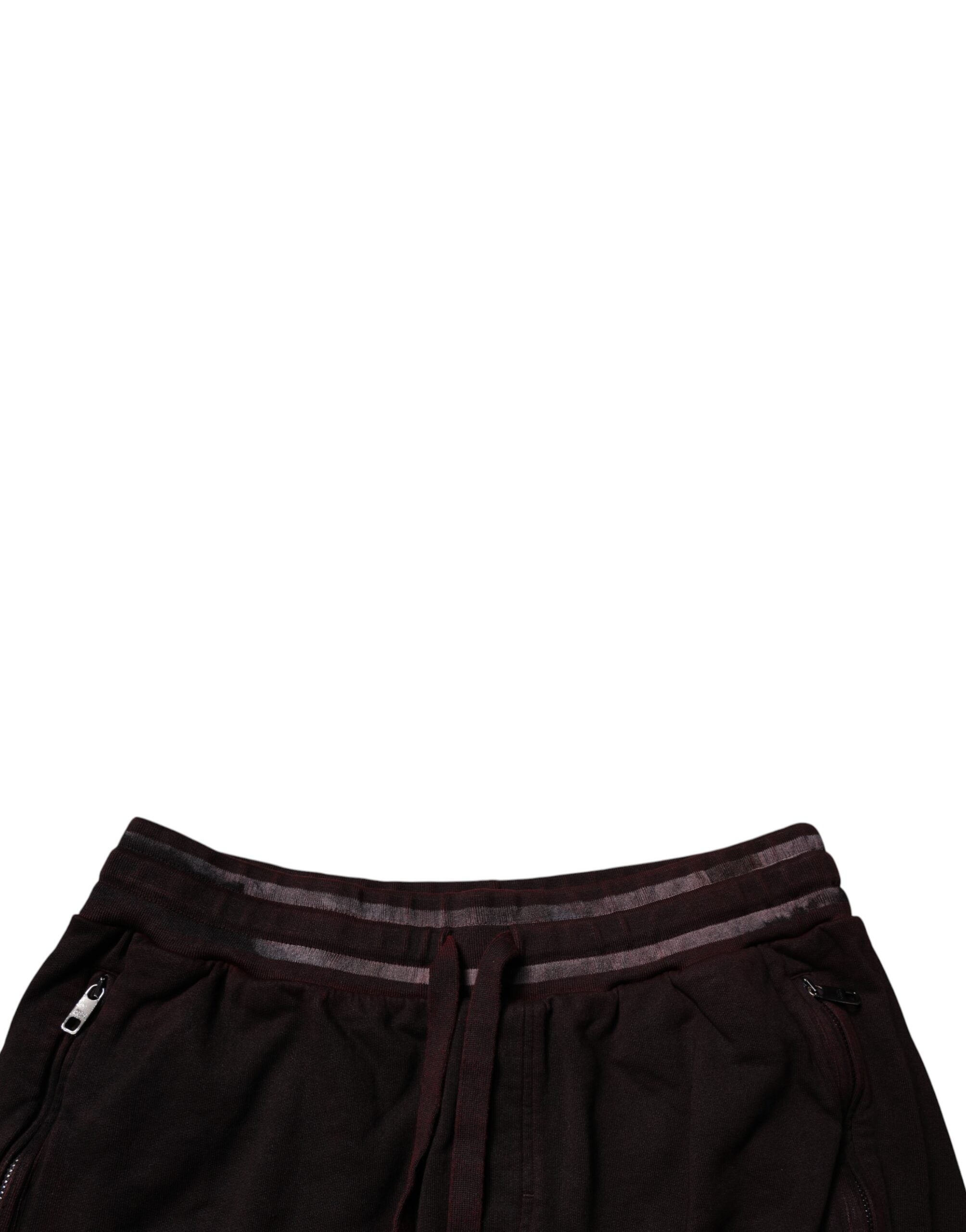 Shorts bermuda en coton marron avec logo Dolce & Gabbana pour homme, détail de la plaque logo visible sur le produit.
