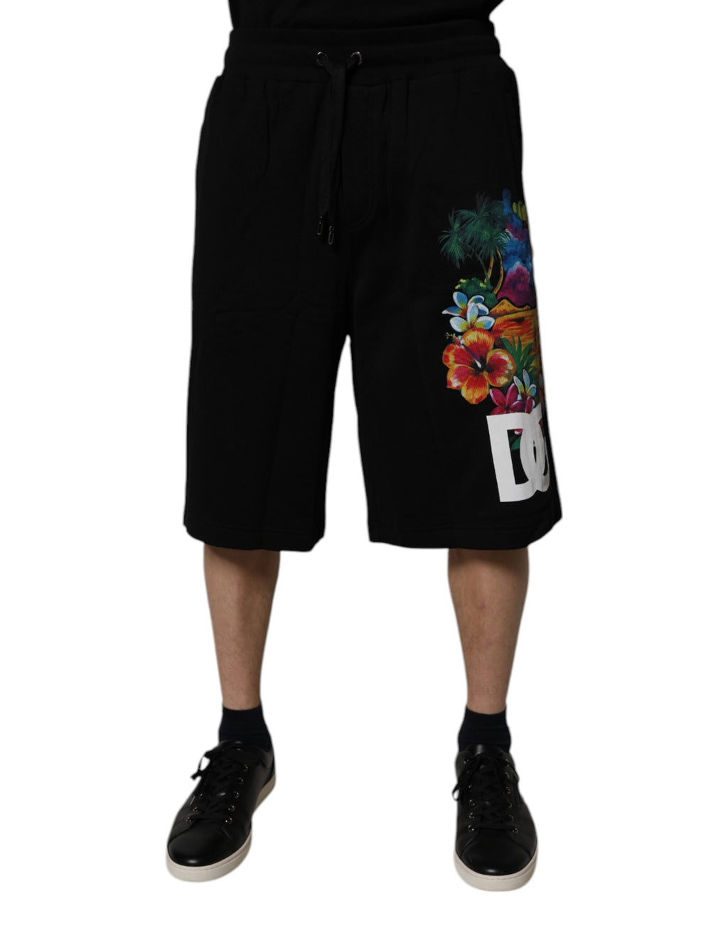 Shorts bermuda en coton noir Dolce & Gabbana avec logo floral imprimé, style décontracté et élégant pour homme.