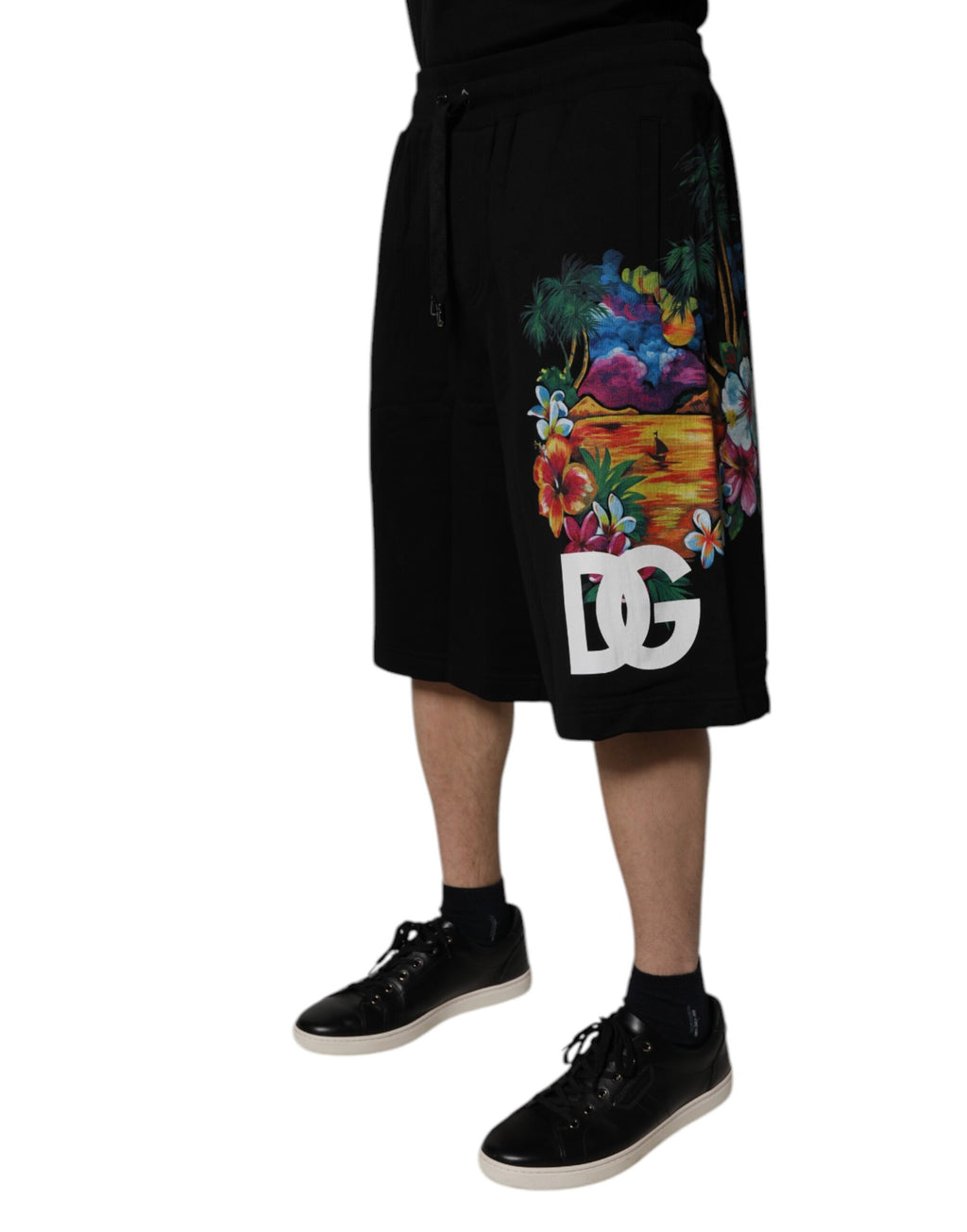 Shorts bermuda en coton noir avec logo Dolce & Gabbana et imprimé floral, style décontracté et élégant.