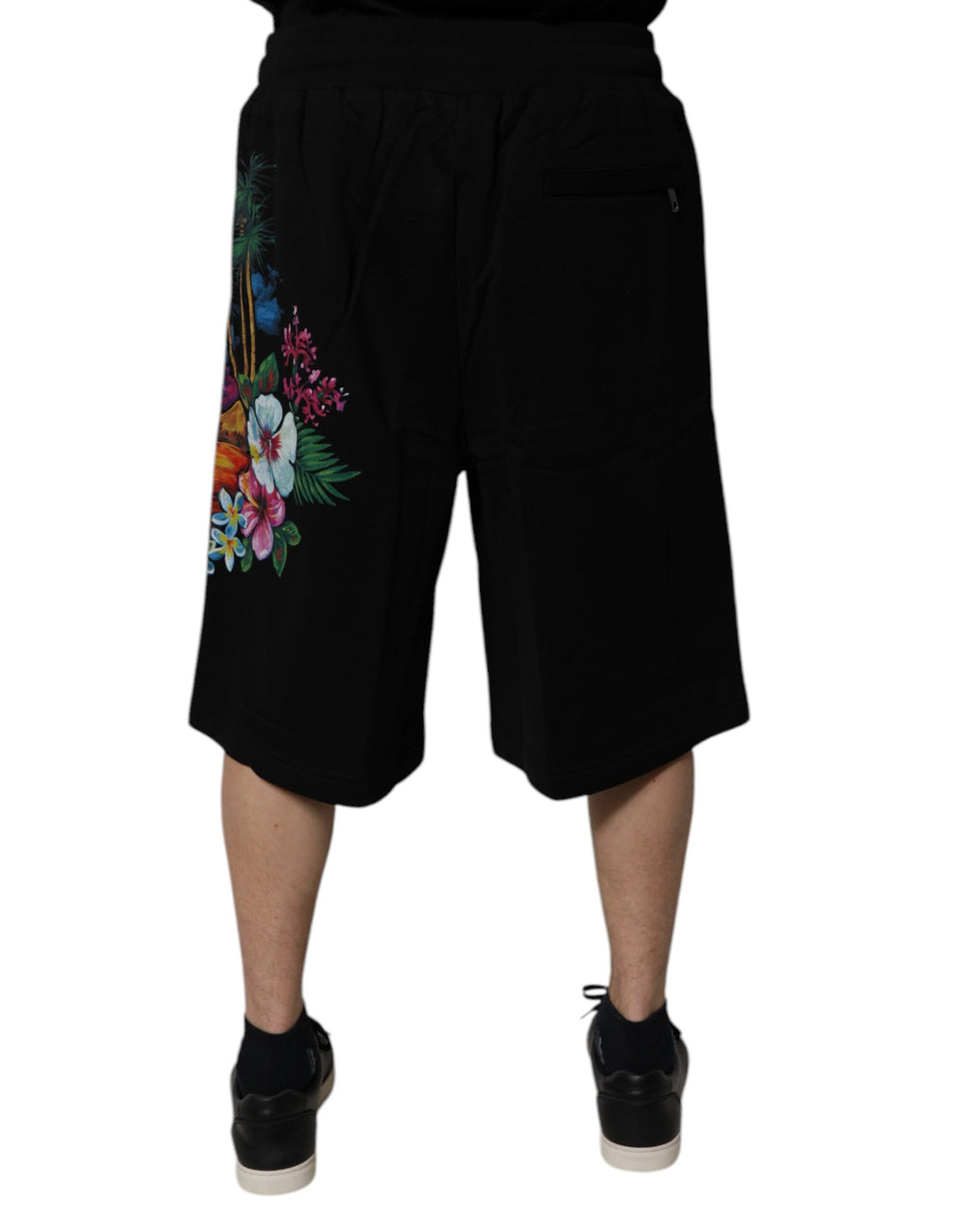 Shorts bermuda en coton noir Dolce & Gabbana avec logo floral imprimé, style élégant et décontracté.