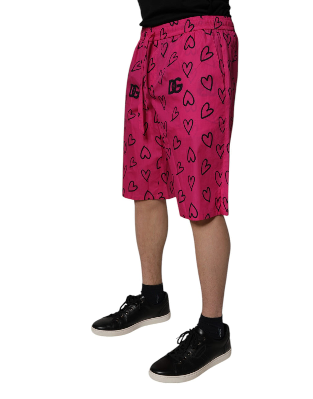 Shorts bermuda en coton rose avec imprimé cœur de Dolce & Gabbana, style décontracté et élégant.