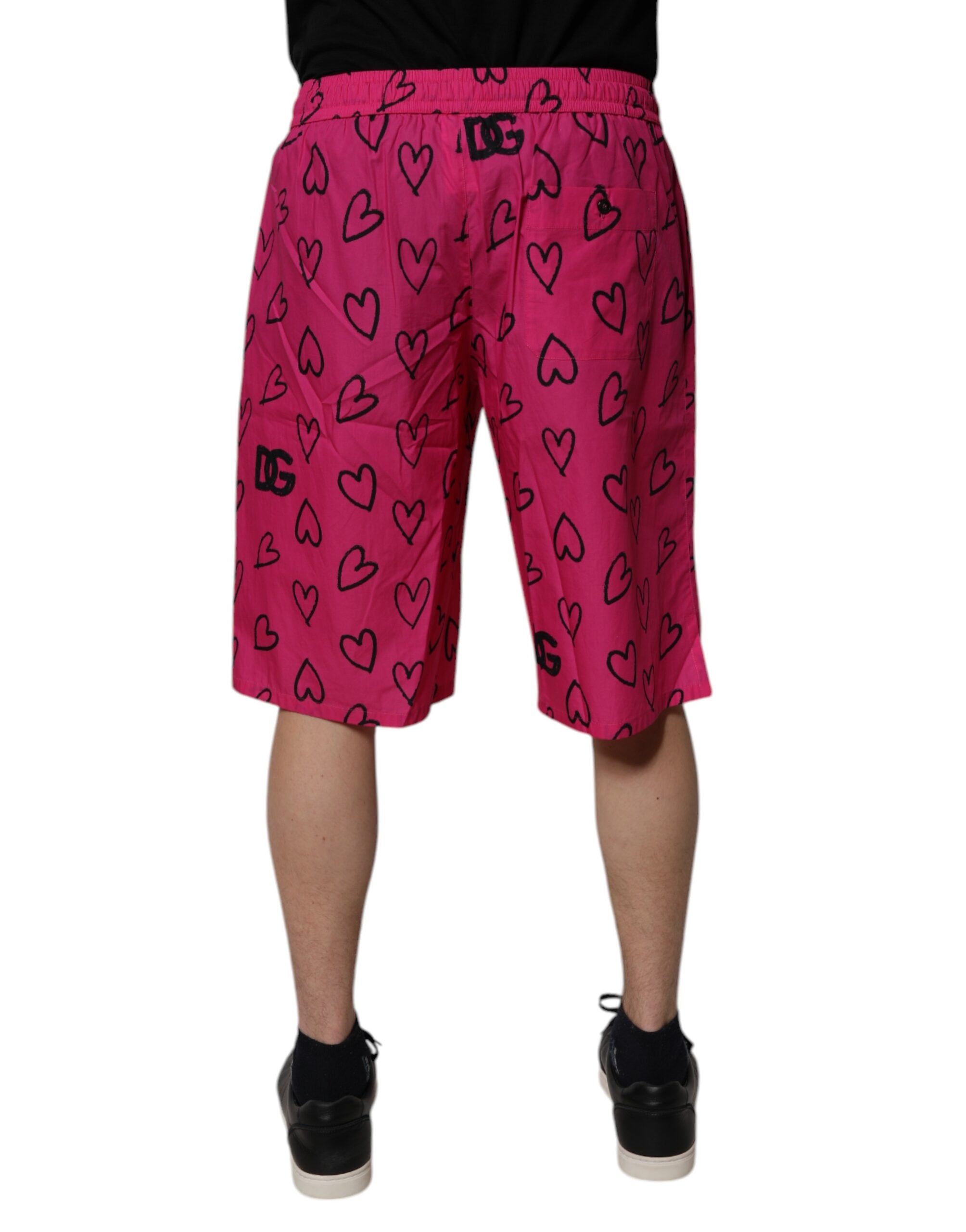 Shorts bermuda en coton rose avec motif cœur de Dolce & Gabbana, style décontracté et élégant pour femmes.