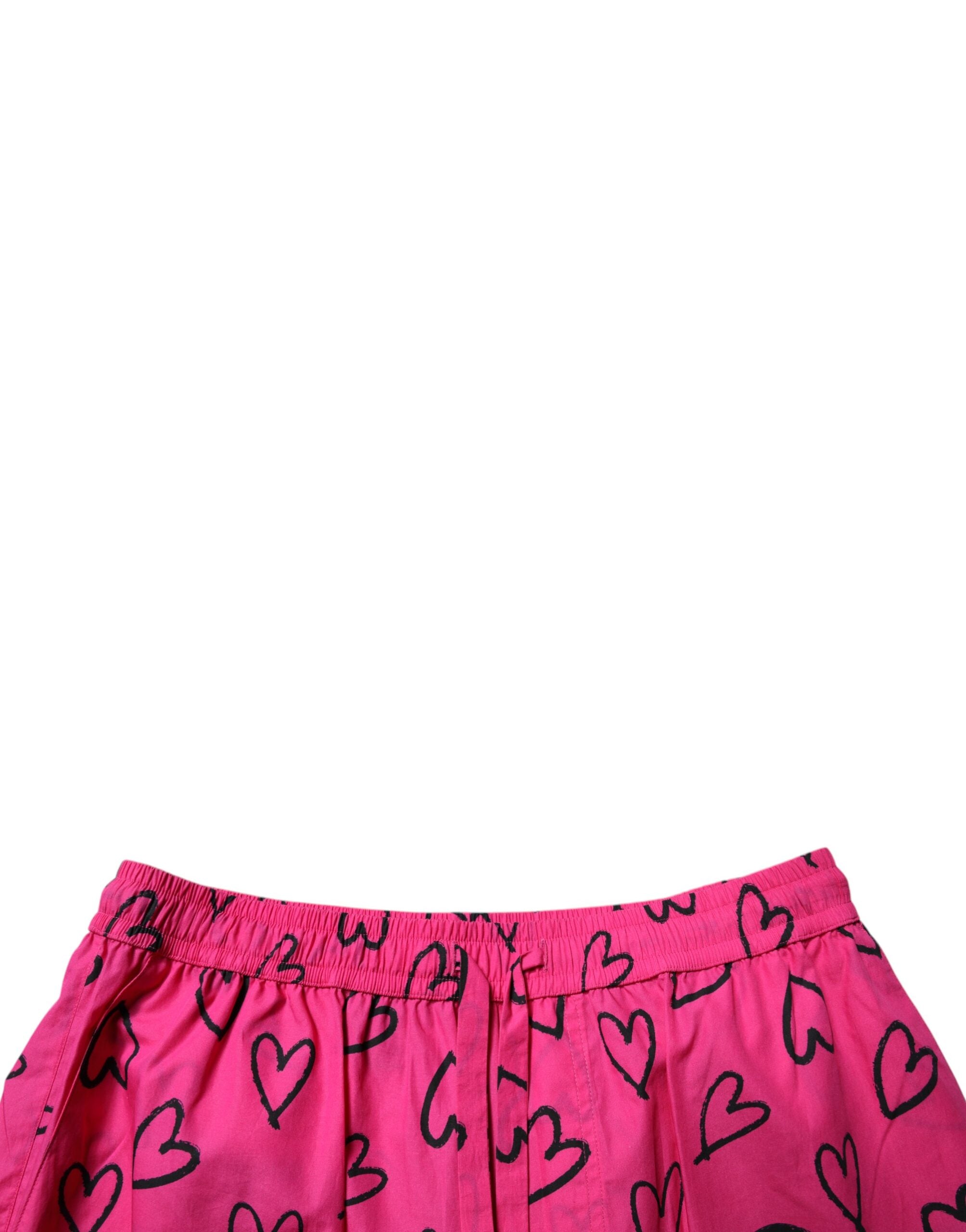 Shorts bermuda en coton rose avec imprimé cœur de Dolce & Gabbana, style décontracté et élégant pour femme.