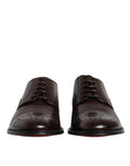 Chaussures Derby pour homme Dolce & Gabbana en cuir de veau bordeaux, élégantes et sophistiquées pour les tenues formelles.