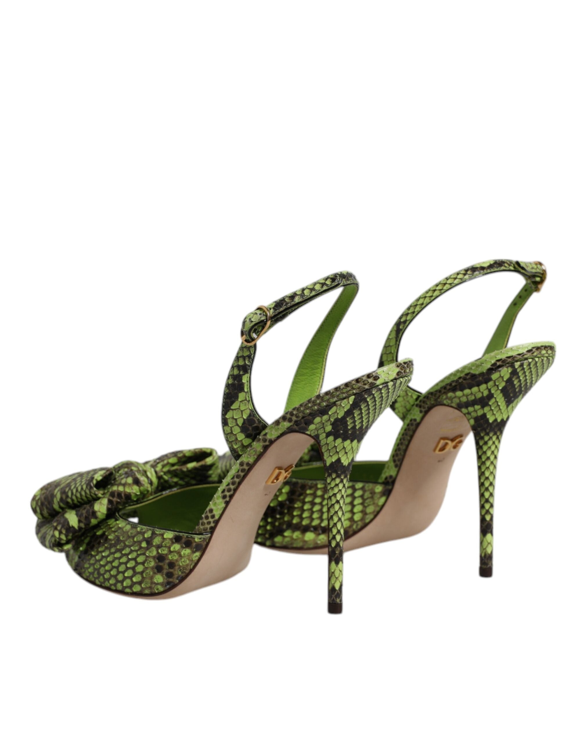 Sandales Dolce & Gabbana en cuir de python vert, talons élégants et design sophistiqué visible sur l'image.