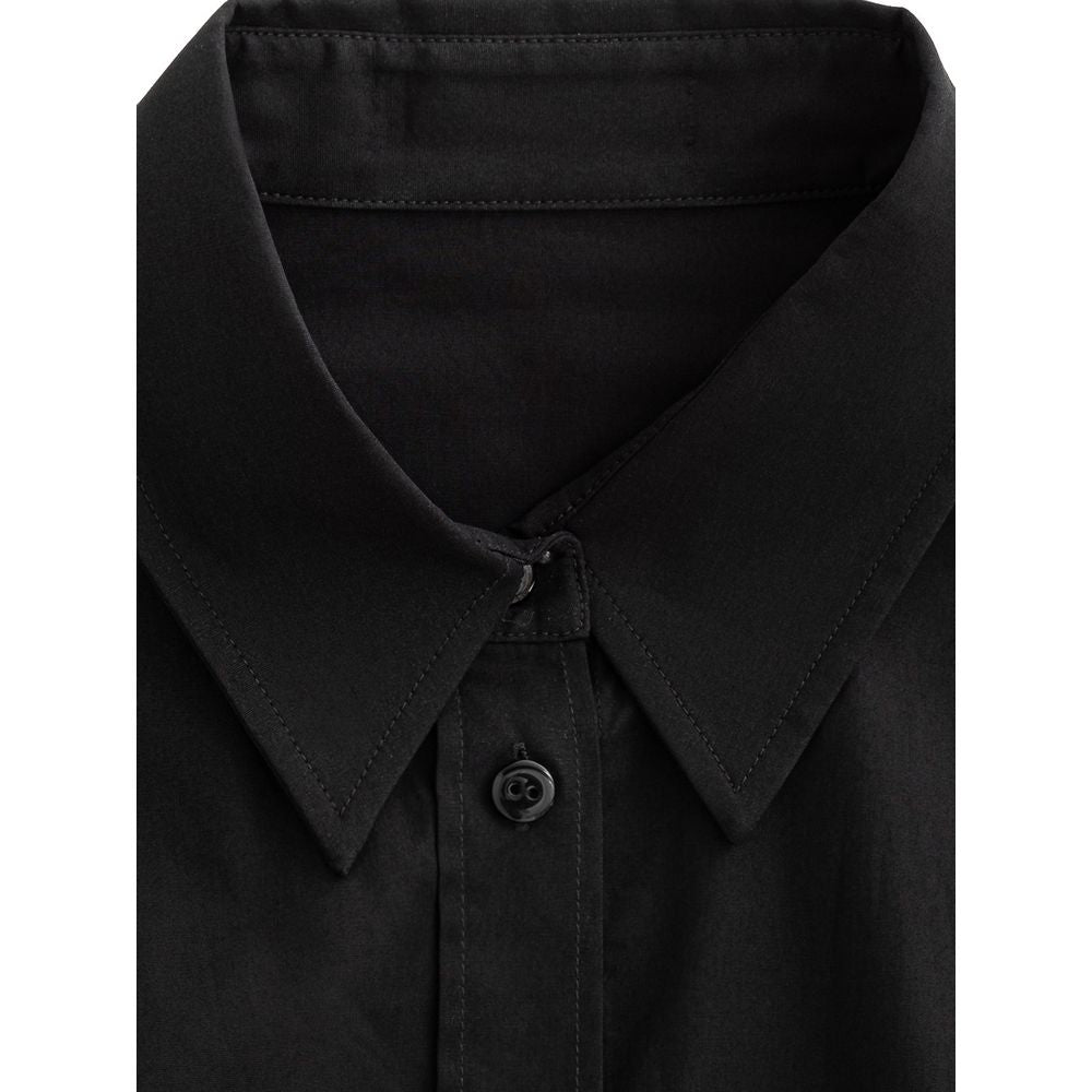 Chemise noire en coton Dolce & Gabbana pour homme, détails élégants et coupe classique visible sur l'image.