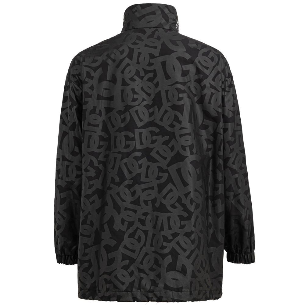 Veste en polyester noire Dolce & Gabbana, coupe élégante, avec détails modernes, conçue pour un style sophistiqué.