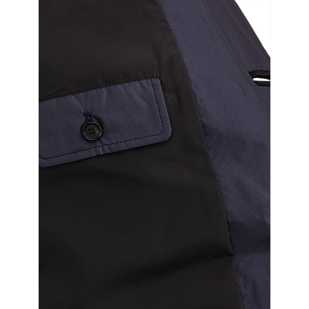 Manteau en polyester bleu Dolce & Gabbana avec col et fermeture à boutons, mode élégante pour femme.