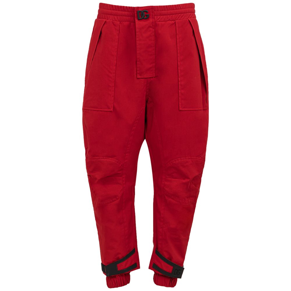 Pantalon de sport en polyamide rouge Dolce & Gabbana, ajusté, avec logo noir sur la jambe, pour homme ou femme.