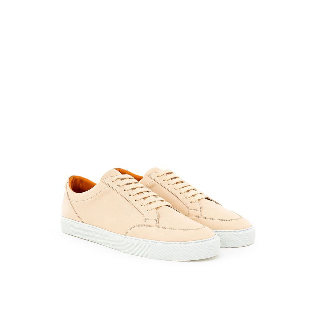 Chaussures basses en cuir rose Burberry, sneakers décontractés pour femme, vue de face avec détails en cuir et semelle blanche.