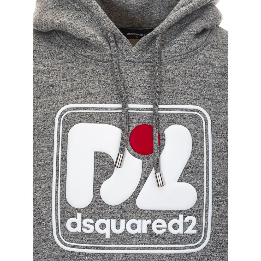 Sweat-shirt gris en coton de la marque Dsquared², pull décontracté avec logo, porté sur un mannequin.