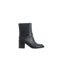 Bottes ankle en cuir noir de Burberry, élégantes et sophistiquées, avec semelle en cuir et détails de marque visibles.