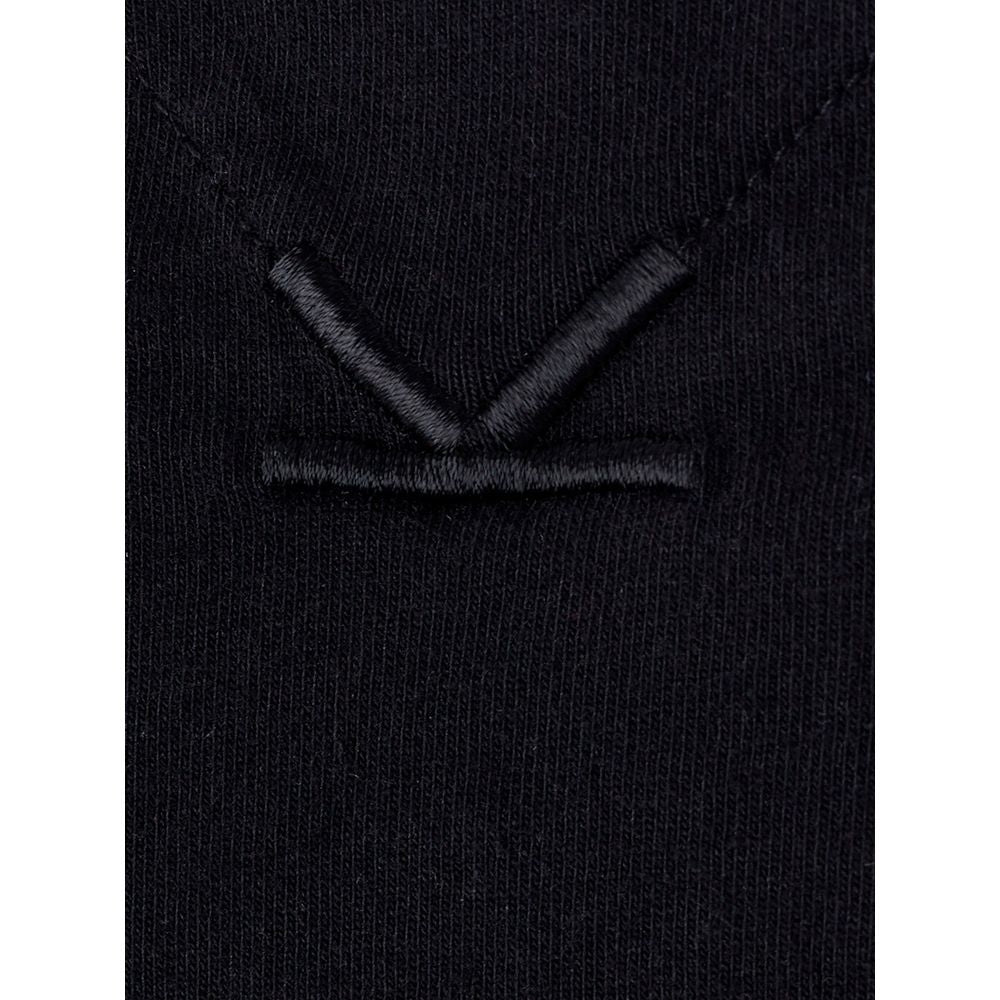 T-shirt en coton noir de la marque Kenzo, veste décontractée avec logo visible, porté par un mannequin.