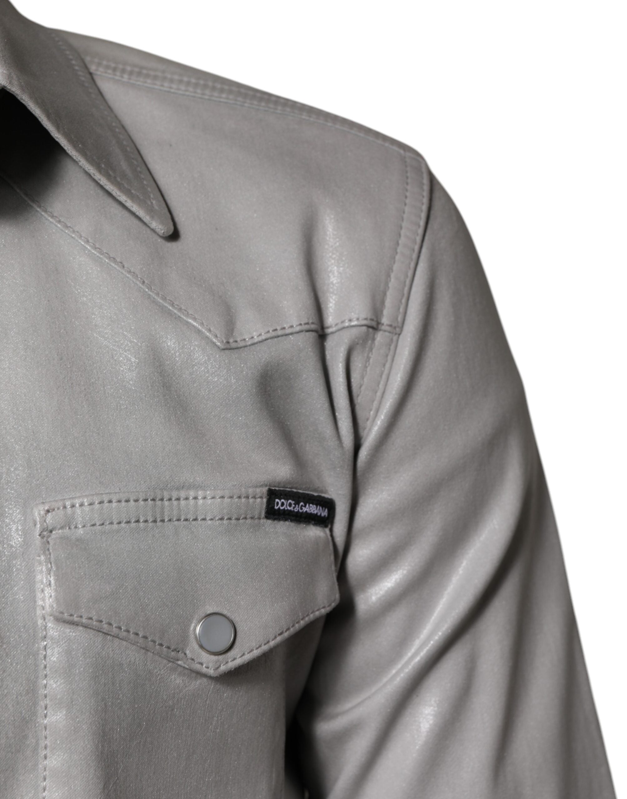 Chemise à manches longues en coton gris métallisé de Dolce & Gabbana, avec boutons devant, style élégant et sophistiqué.