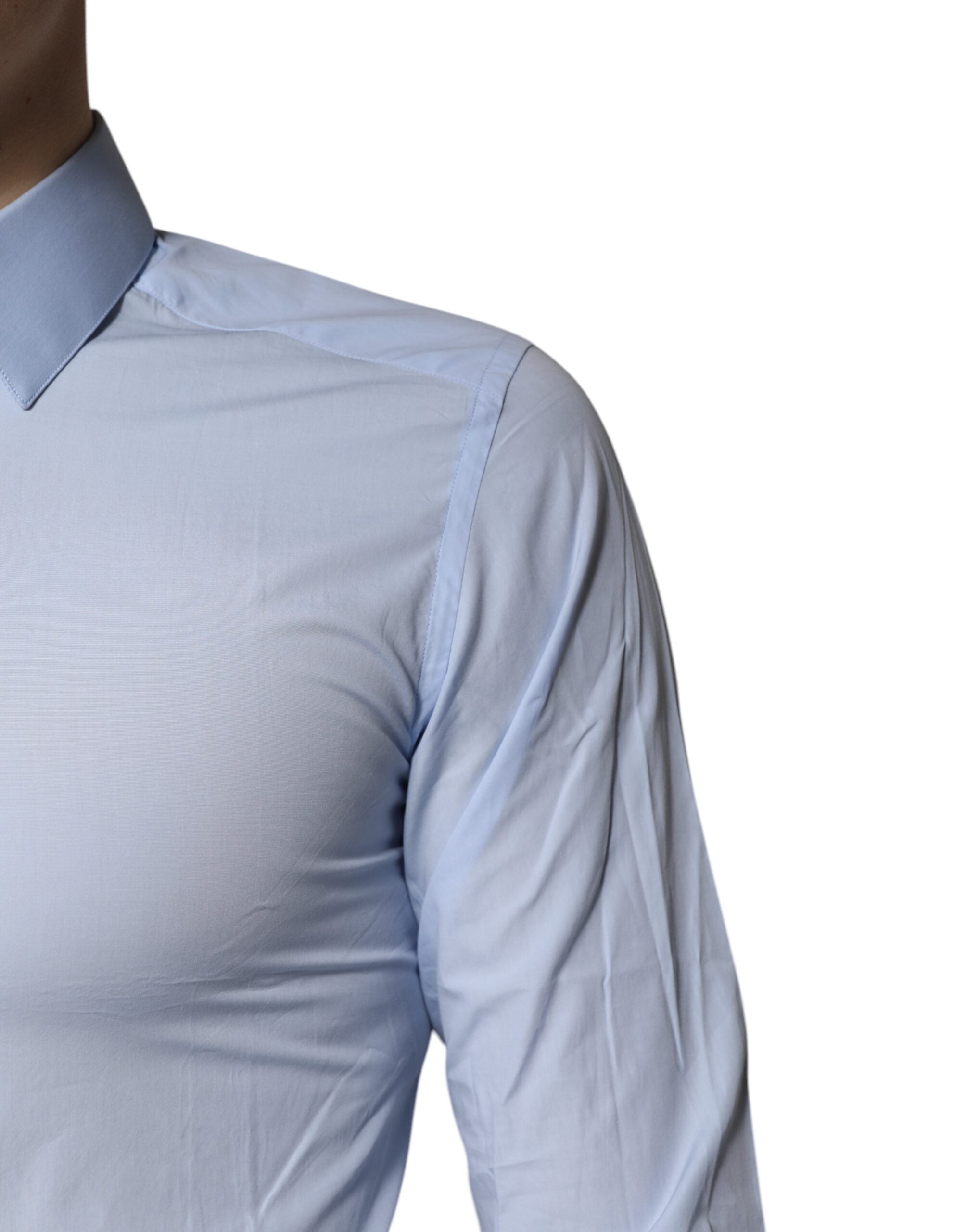 Chemise formelle Dolce & Gabbana Light Blue en coton avec détails dorés, élégante et sophistiquée pour occasion spéciale.