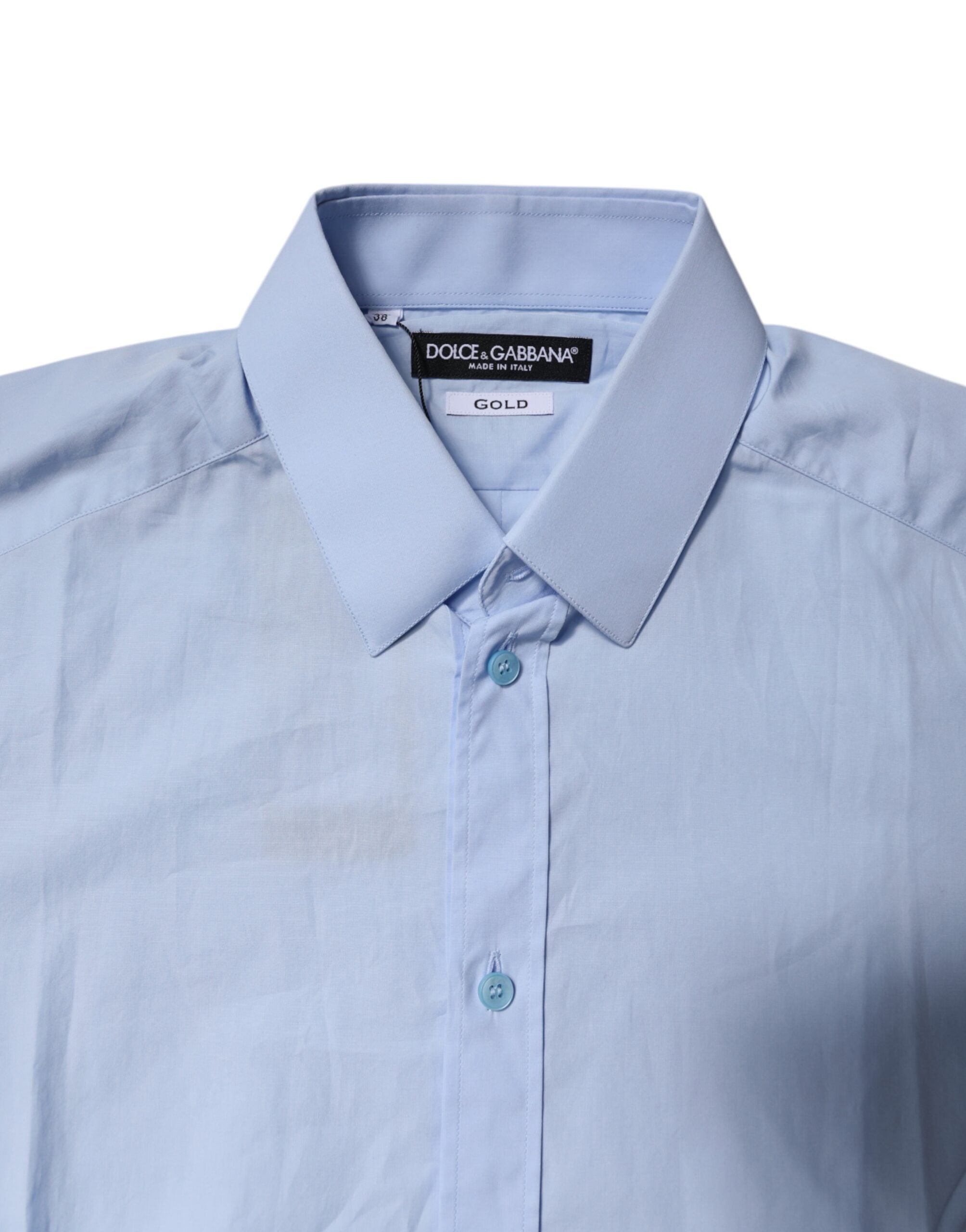 Chemise formelle Dolce & Gabbana Light Blue en coton avec détails dorés, style élégant et sophistiqué.