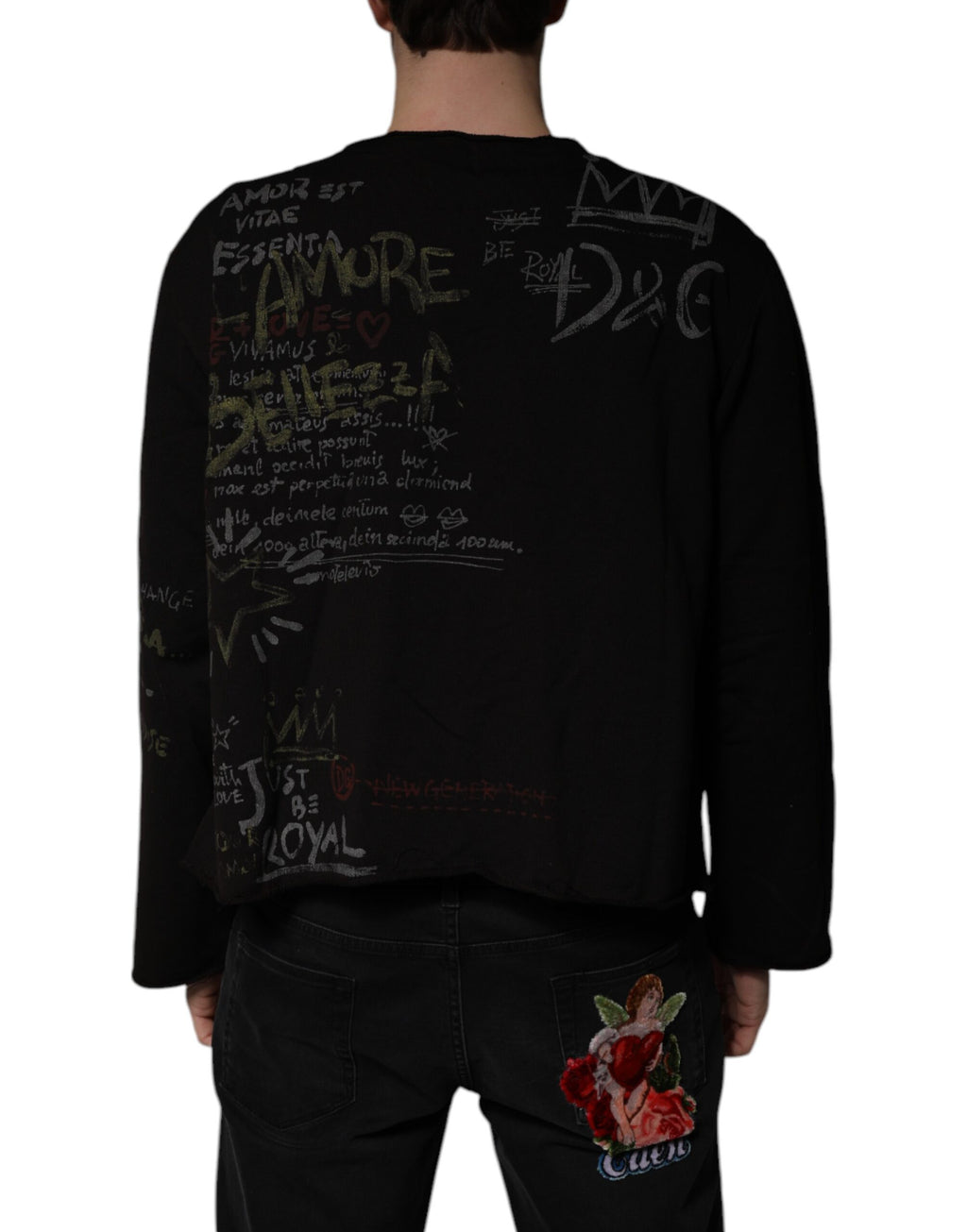 Pull noir Dolce & Gabbana DG Heaven à col rond, vue de face, en laine, avec logo discret sur la poitrine.