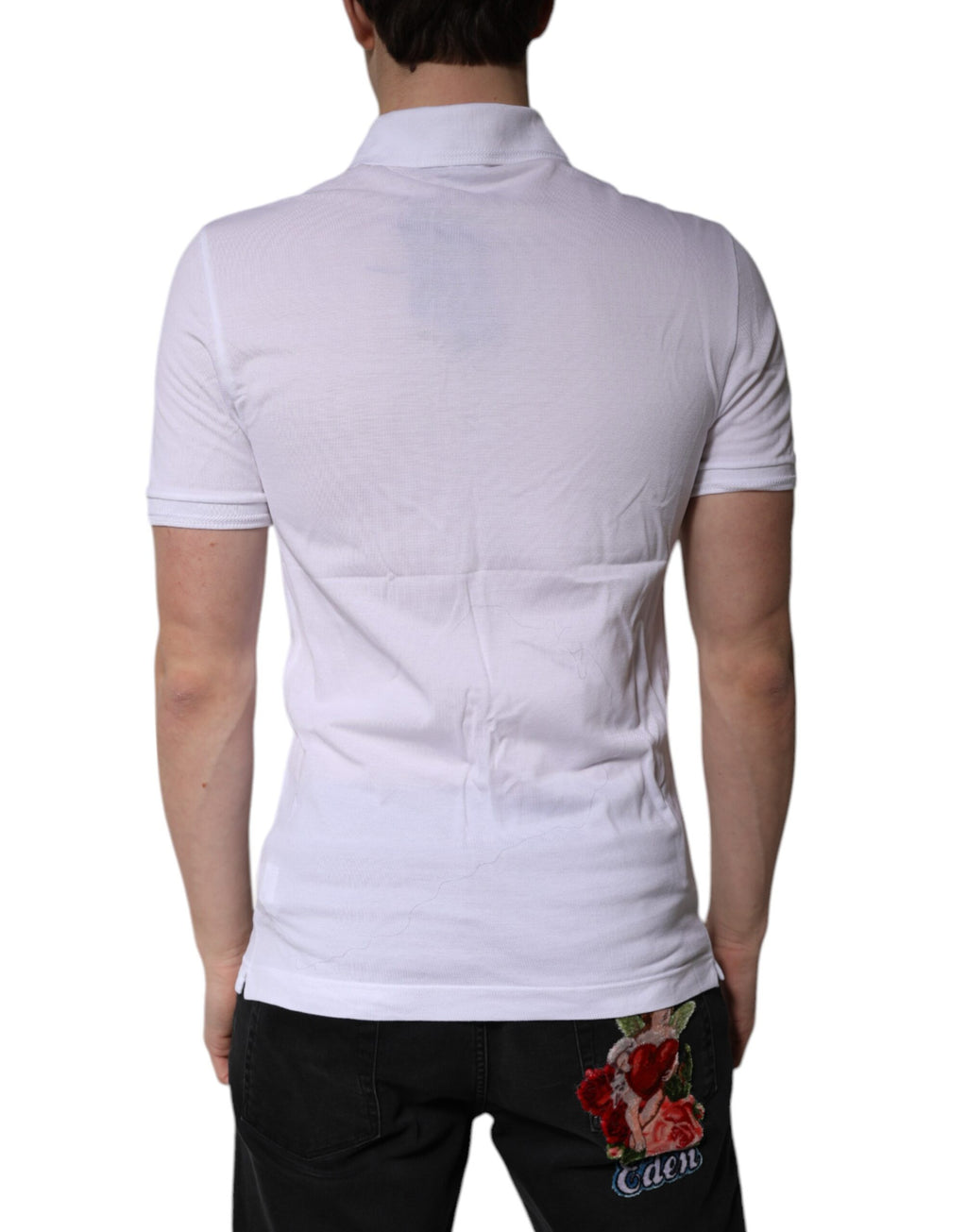 T-shirt polo blanc en coton avec logo Dolce & Gabbana, col classique, vue de face.