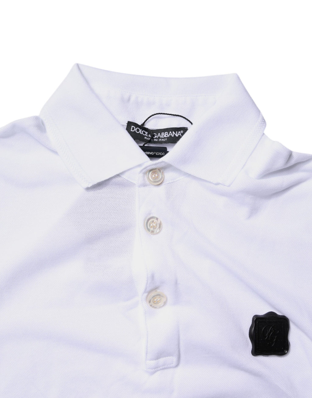 Polo blanc en coton Dolce & Gabbana avec logo, col classique, tissu doux, élégant et confortable pour homme.