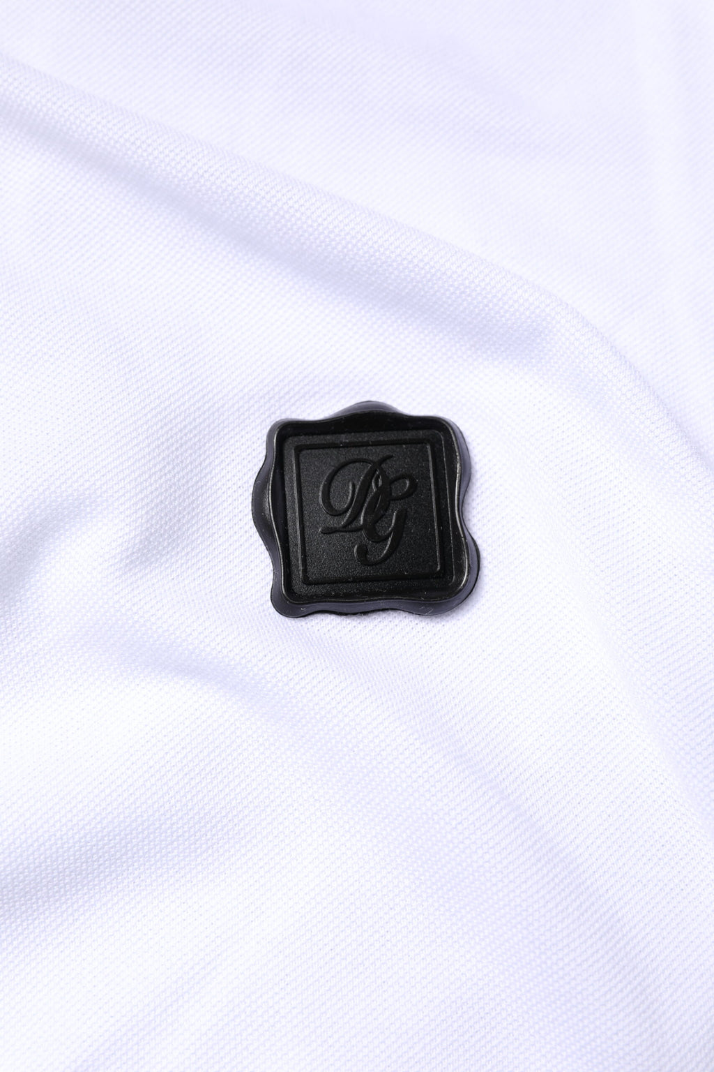 T-shirt polo blanc en coton Dolce & Gabbana avec logo et col, mode élégante pour homme.