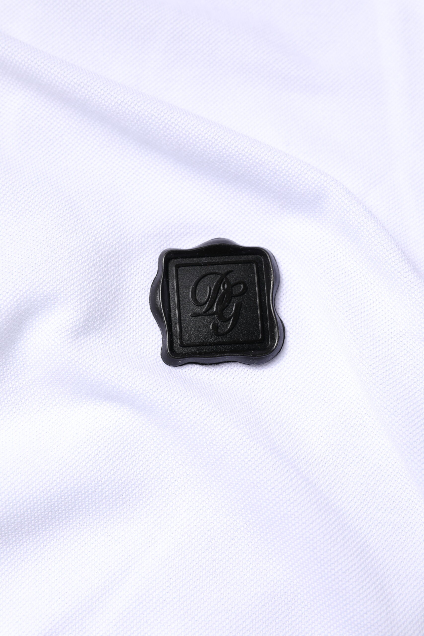 T-shirt polo blanc en coton Dolce & Gabbana avec logo et col, mode élégante pour homme.