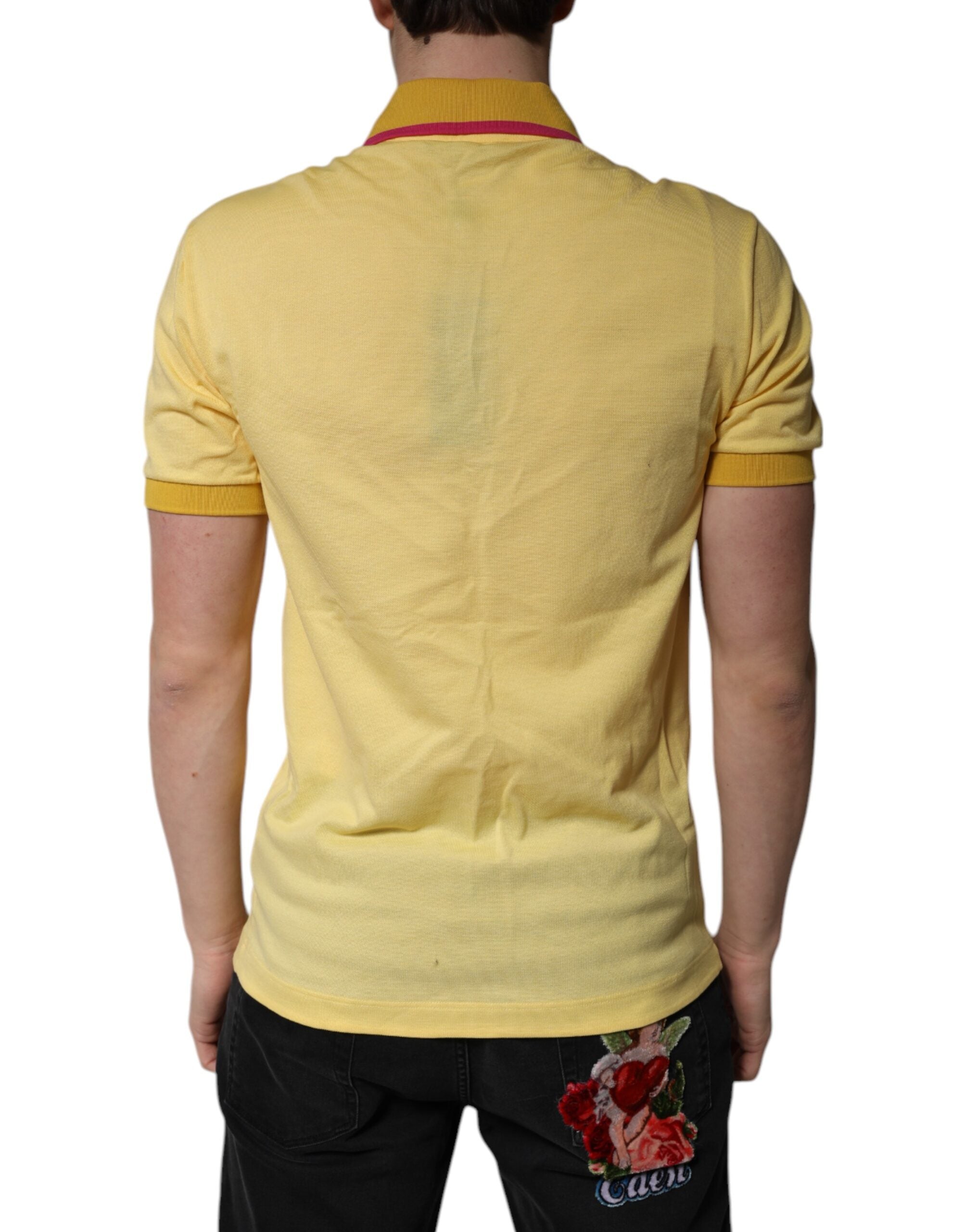 T-shirt polo en coton jaune Dolce & Gabbana avec logo brodé, col classique, mode élégante et décontractée.
