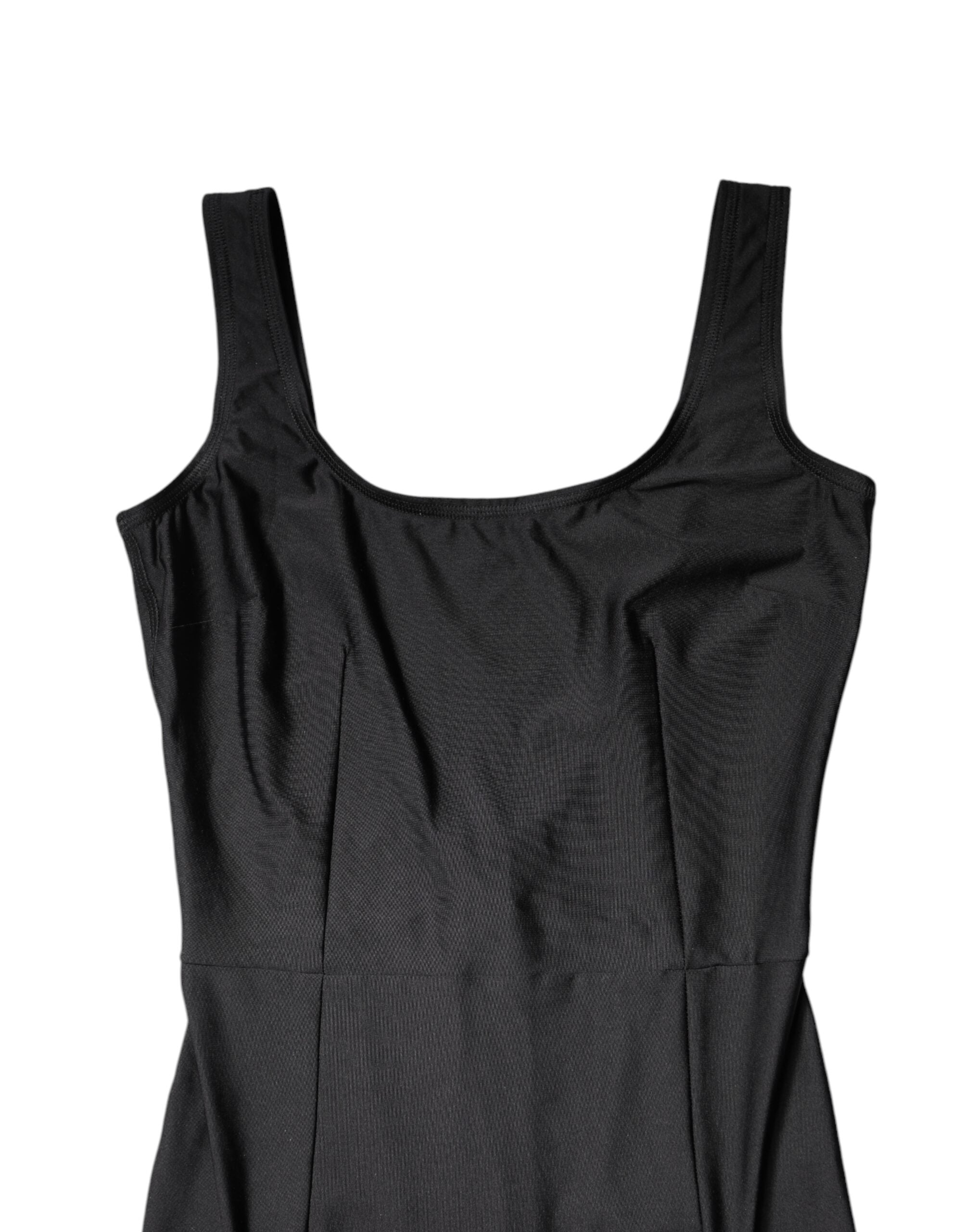 Combinaison sans manches noire Dolce & Gabbana pour femme, coupe ajustée et élégante, en tissu fluide et sophistiqué.