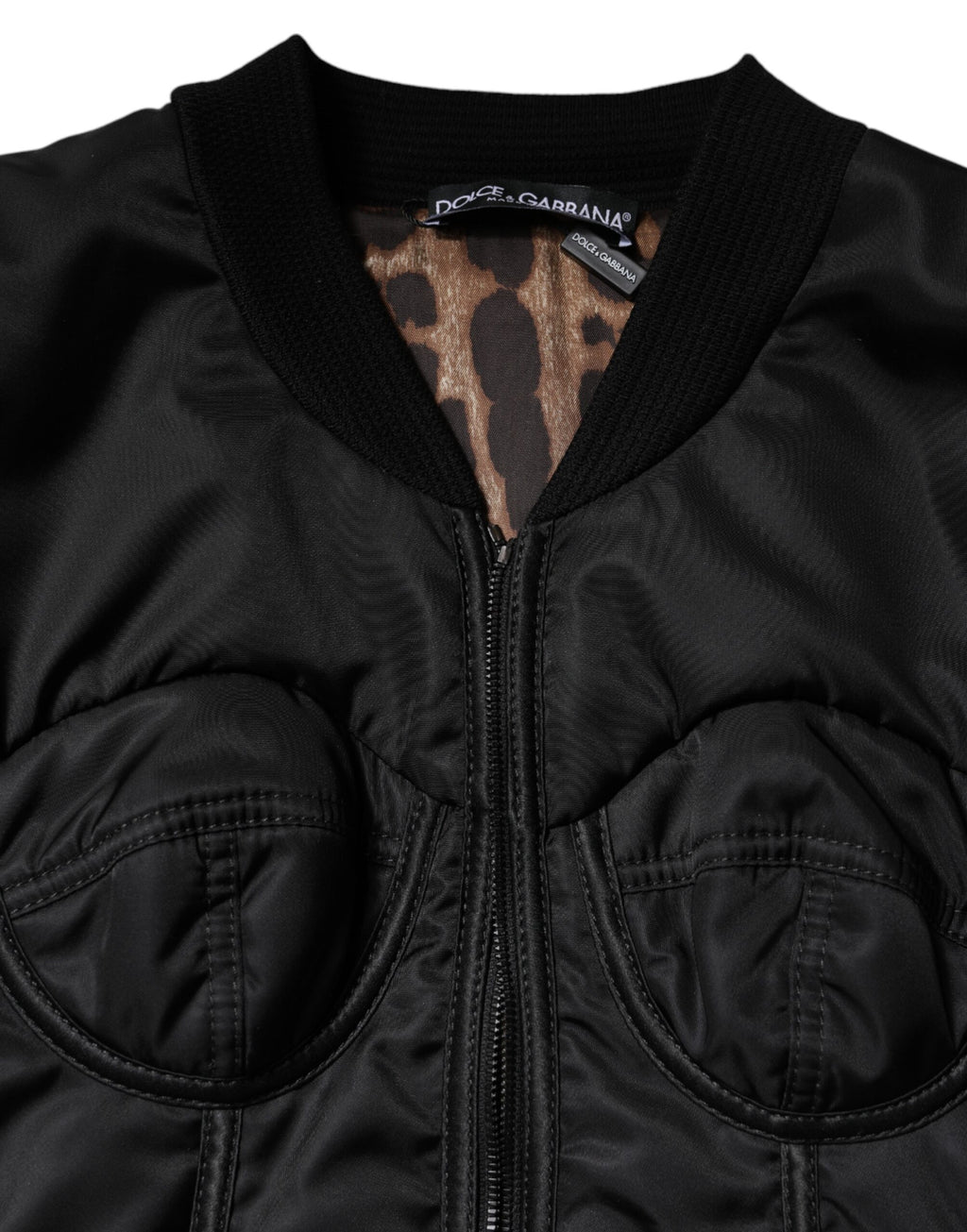Veste corset Dolce & Gabbana en nylon noir avec fermeture éclair complète, design ajusté et moderne.