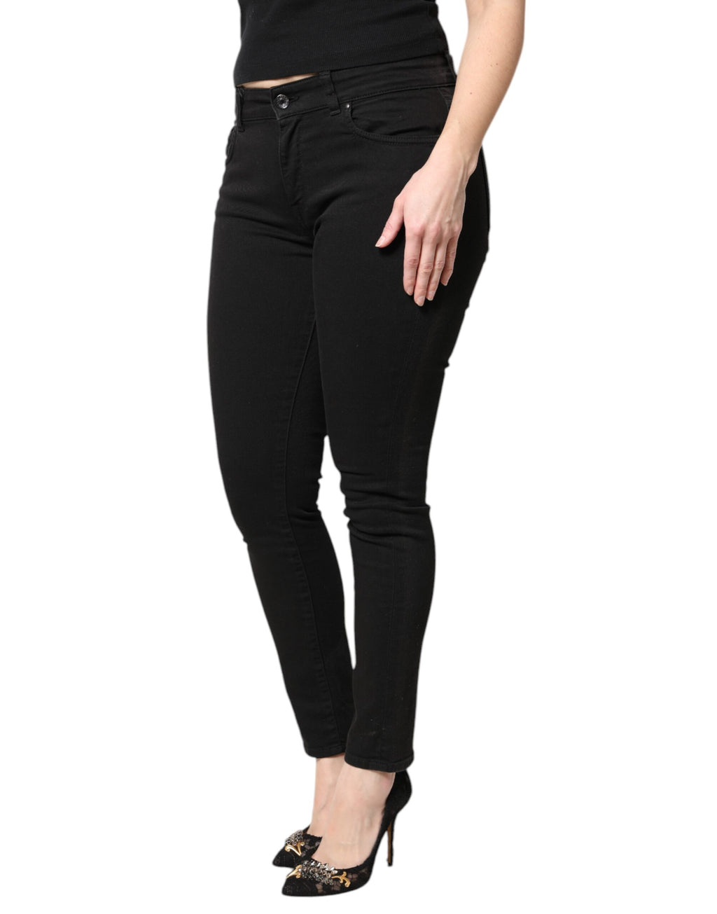 Jeans skinny en coton noir à taille moyenne Dolce & Gabbana, coupe ajustée et style moderne, visible sur l’image.