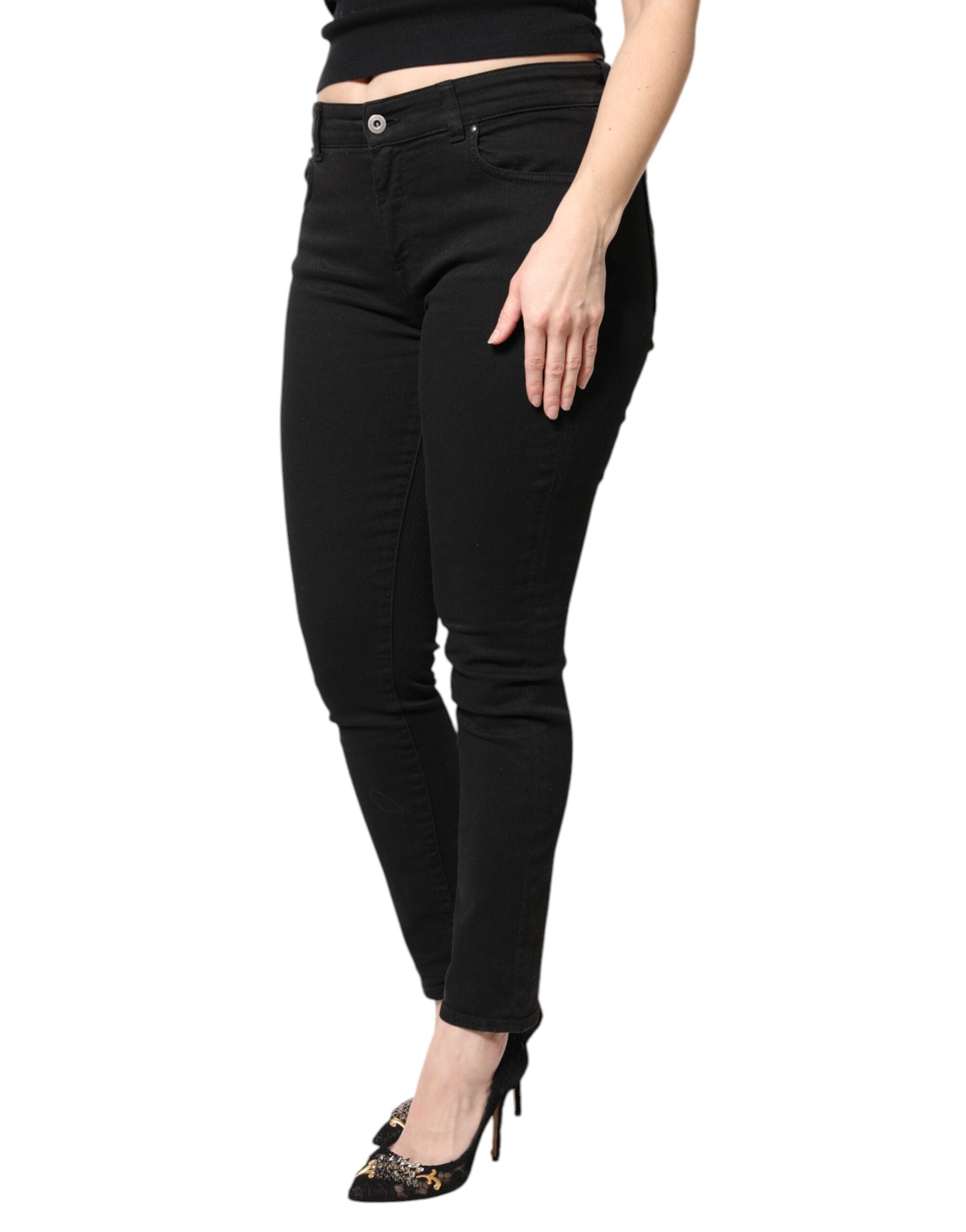Jeans skinny en coton noir de mi-taille Dolce & Gabbana, coupe ajustée et élégante, visibles avec détails de couture.