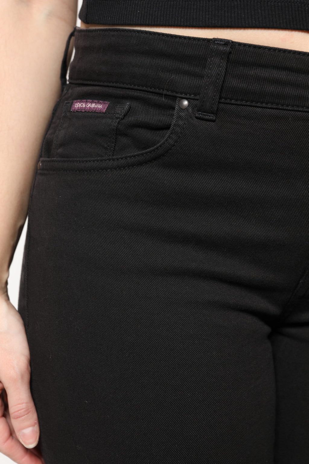 Jeans skinny en coton noir à taille moyenne de Dolce & Gabbana, coupe ajustée et style tendance.