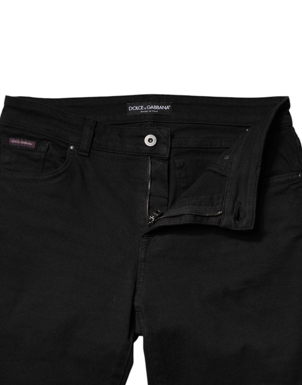Jeans skinny en coton noir à taille moyenne de Dolce & Gabbana, coupe ajustée et élégante.