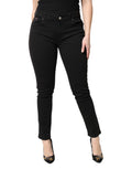 Jeans skinny en coton noir à taille moyenne de Dolce & Gabbana, coupe ajustée et élégante, visibles avec détails de la couture.