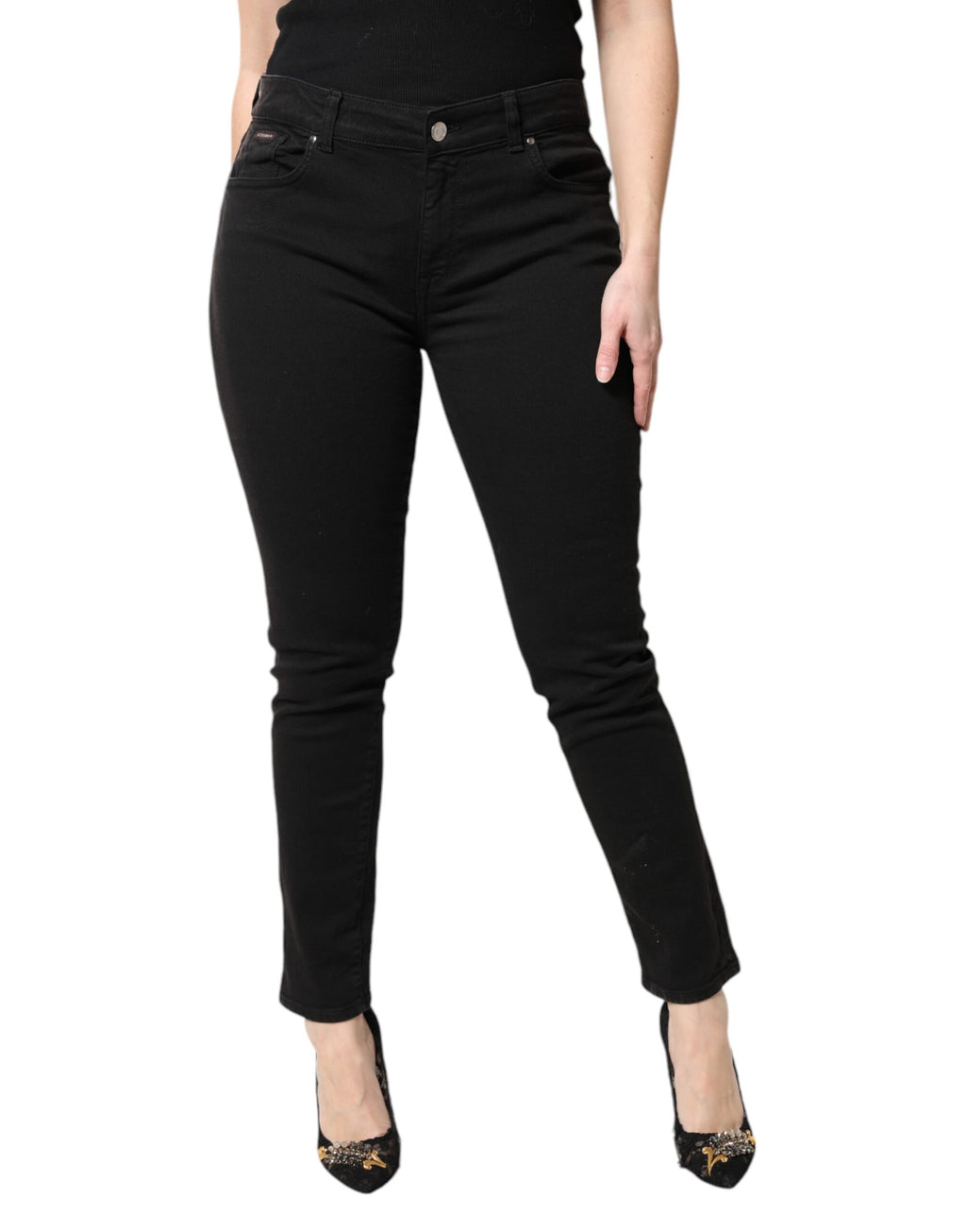Jeans skinny en coton noir à taille mi-haute de Dolce & Gabbana, coupe ajustée et détails classiques en denim.