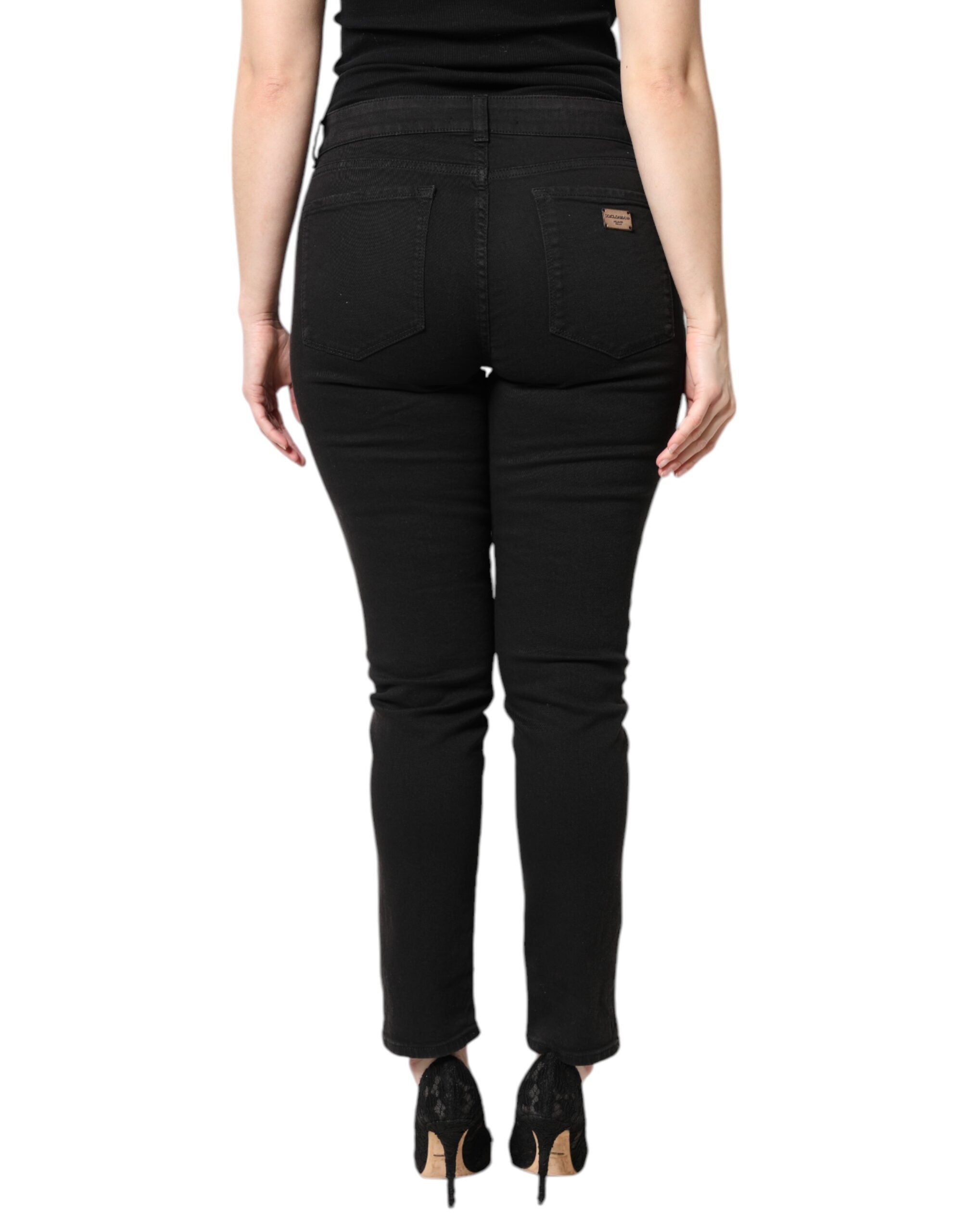 Jeans skinny en coton noir à taille moyenne de Dolce & Gabbana, coupe ajustée et style moderne.