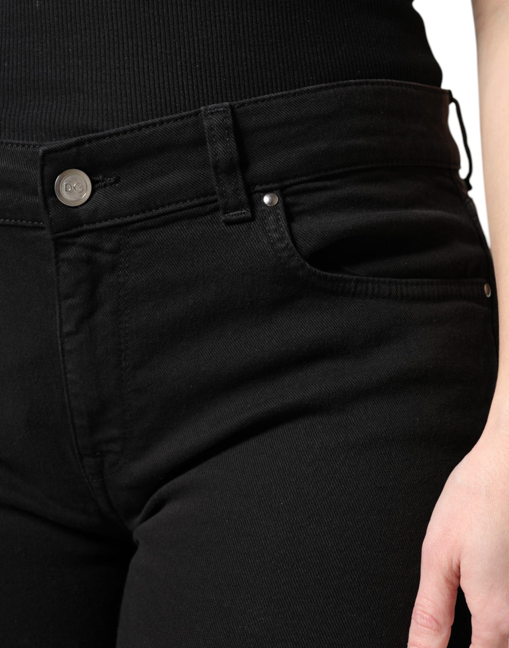 Jeans skinny noirs en coton à taille moyenne de Dolce & Gabbana, coupe ajustée et style moderne.