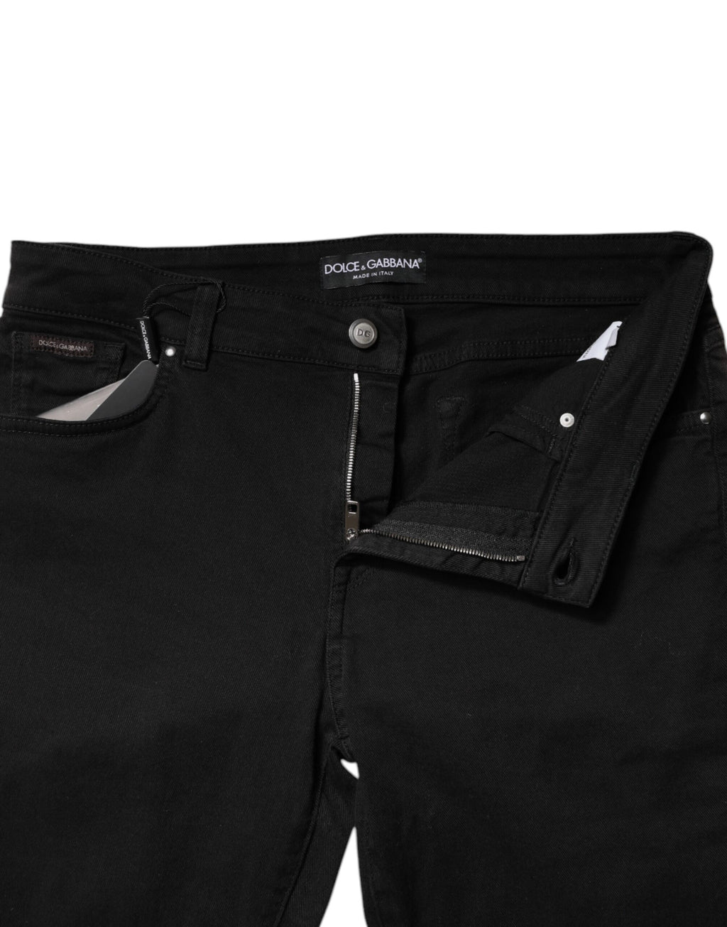 Jeans skinny en coton noir à taille moyenne de Dolce & Gabbana, coupe ajustée et moderne, visibles en image.