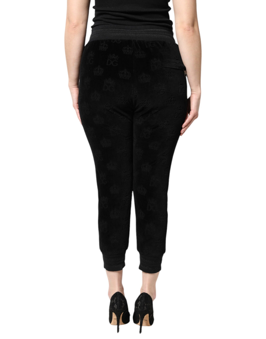 Pantalons de jogging noirs Dolce & Gabbana avec logo DG imprimé en all-over, tissu confortable et style décontracté.