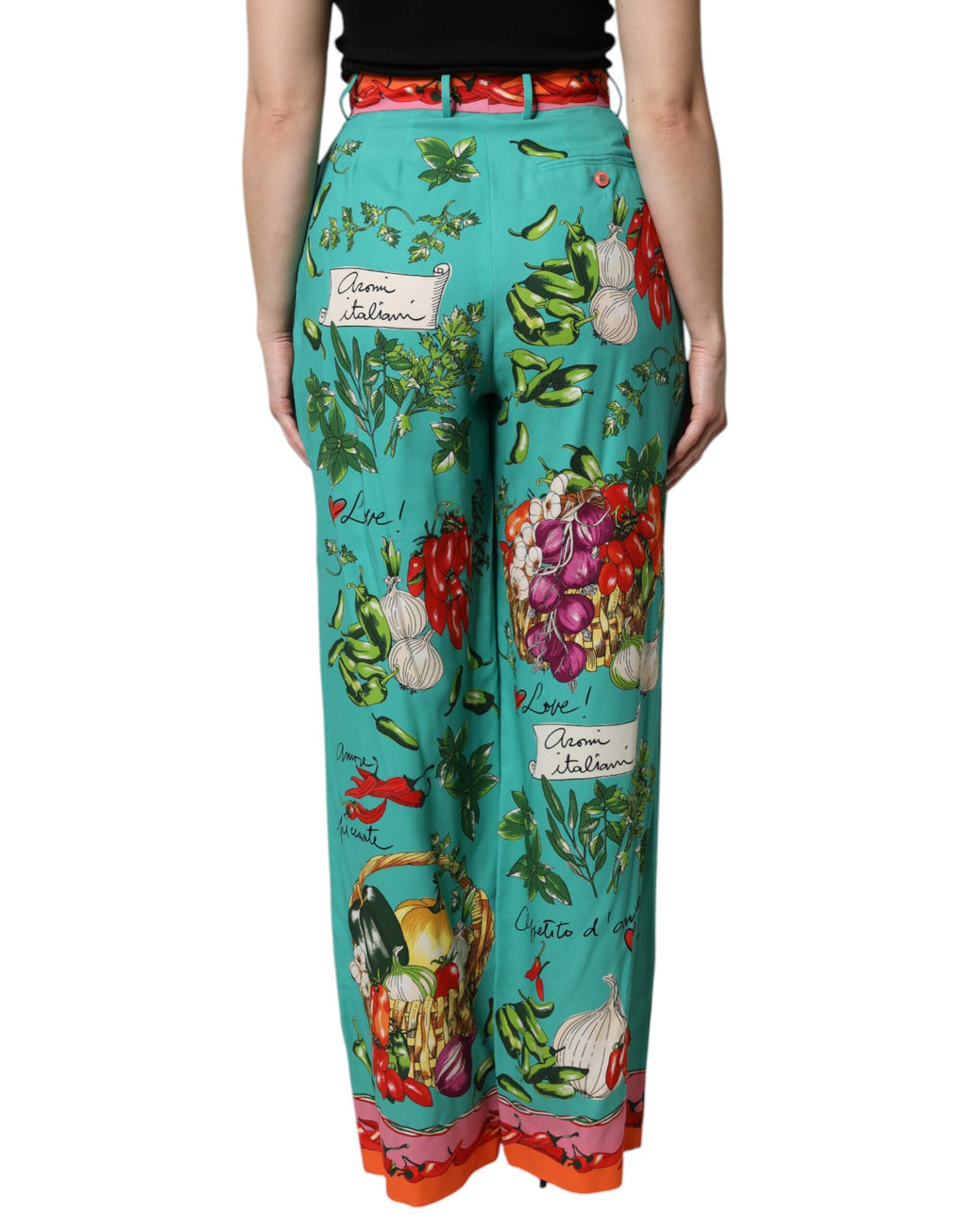 Pantalons droits en soie imprimée verte de Dolce & Gabbana, style élégant avec motif floral.