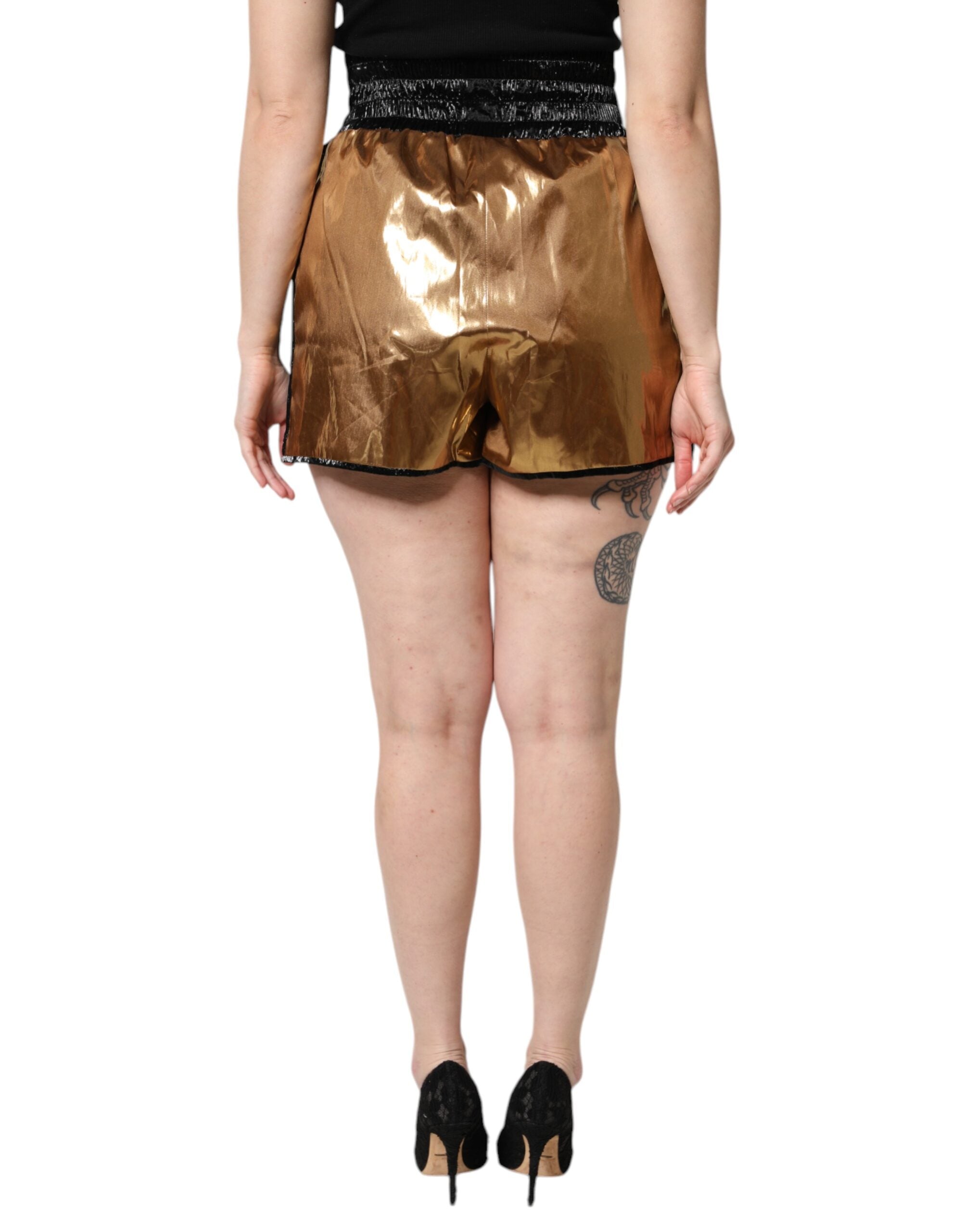 Hotpants dorés à taille haute de Dolce & Gabbana, pièce métallique élégante pour femmes.