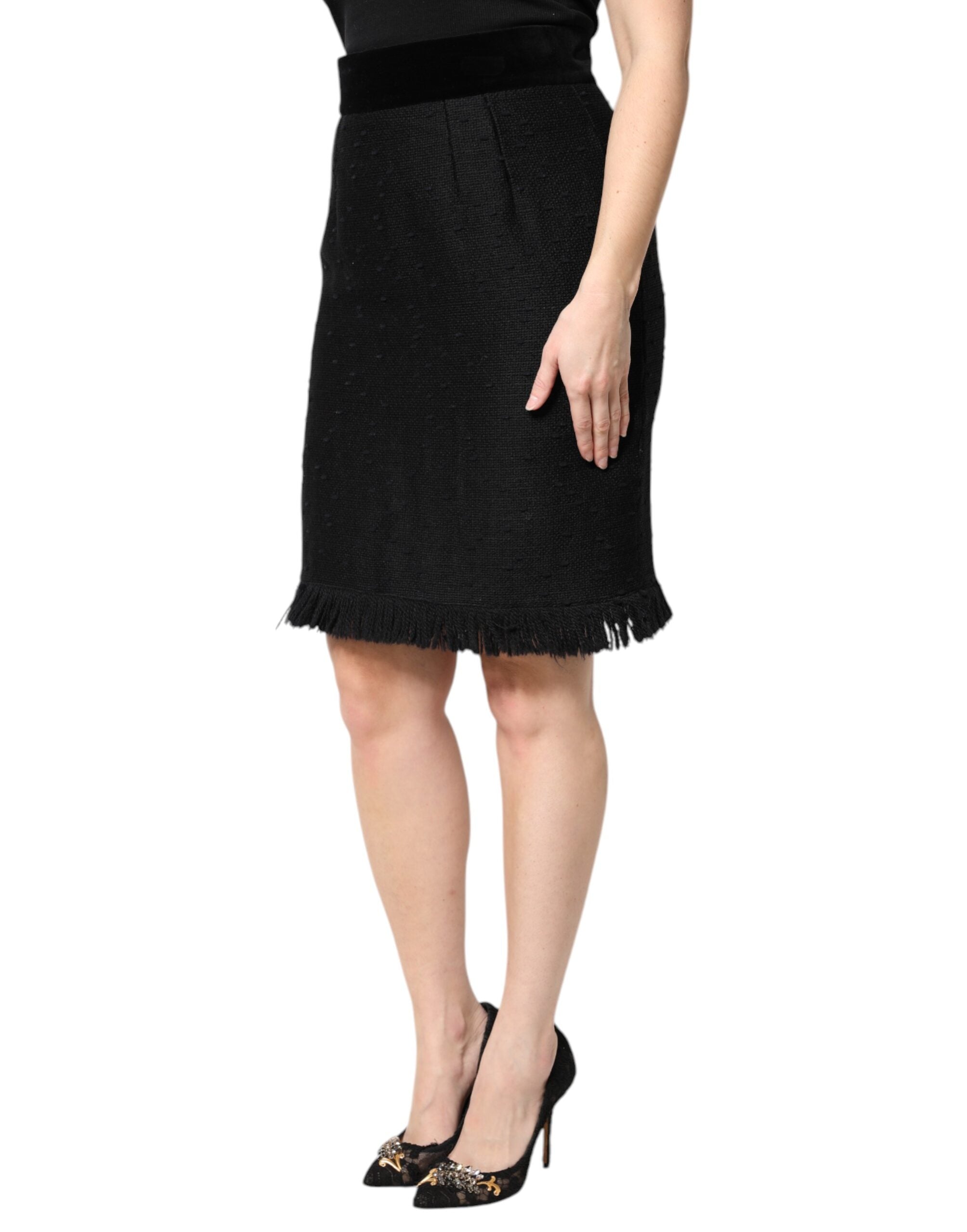 Jupe courte en laine noire Dolce & Gabbana à franges, taille haute, style pencil, ajustée et élégante.