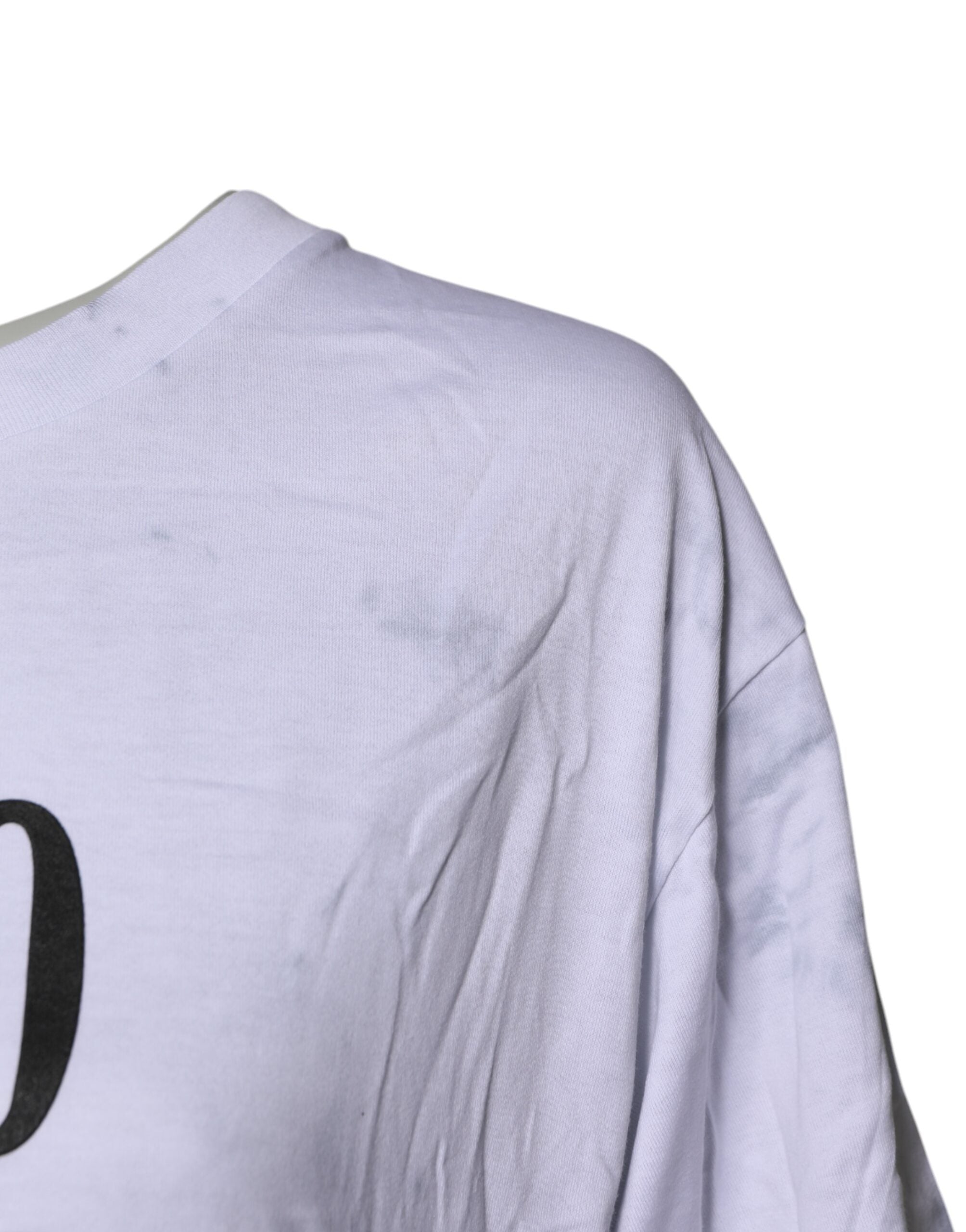 T-shirt blanc Dolce & Gabbana en coton avec imprimé, col rond et laçage, vue de face.